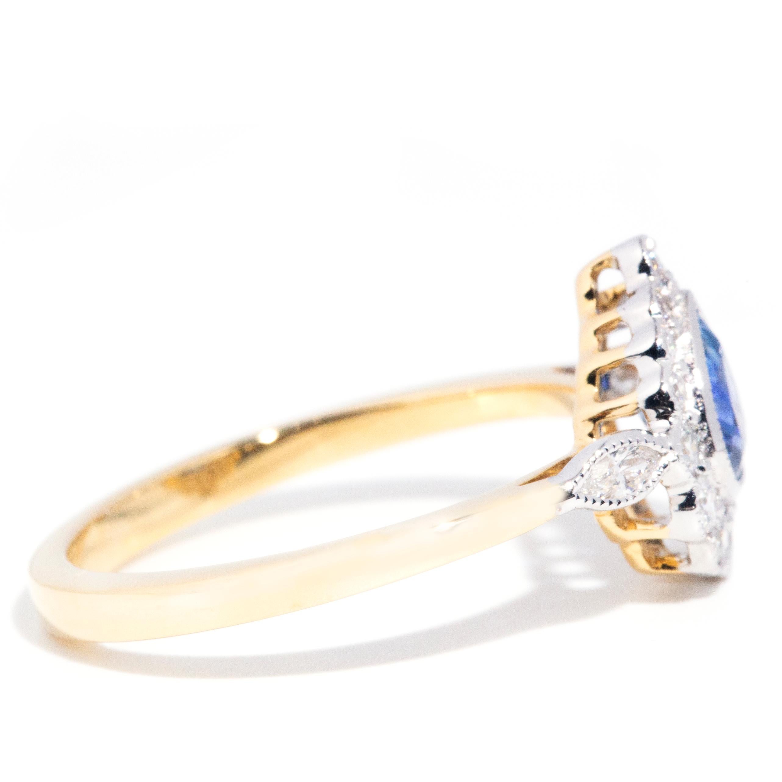 0.70 Carat Natural Sapphire and Diamond 18 Carat Gold Contemporary Halo Ring 2