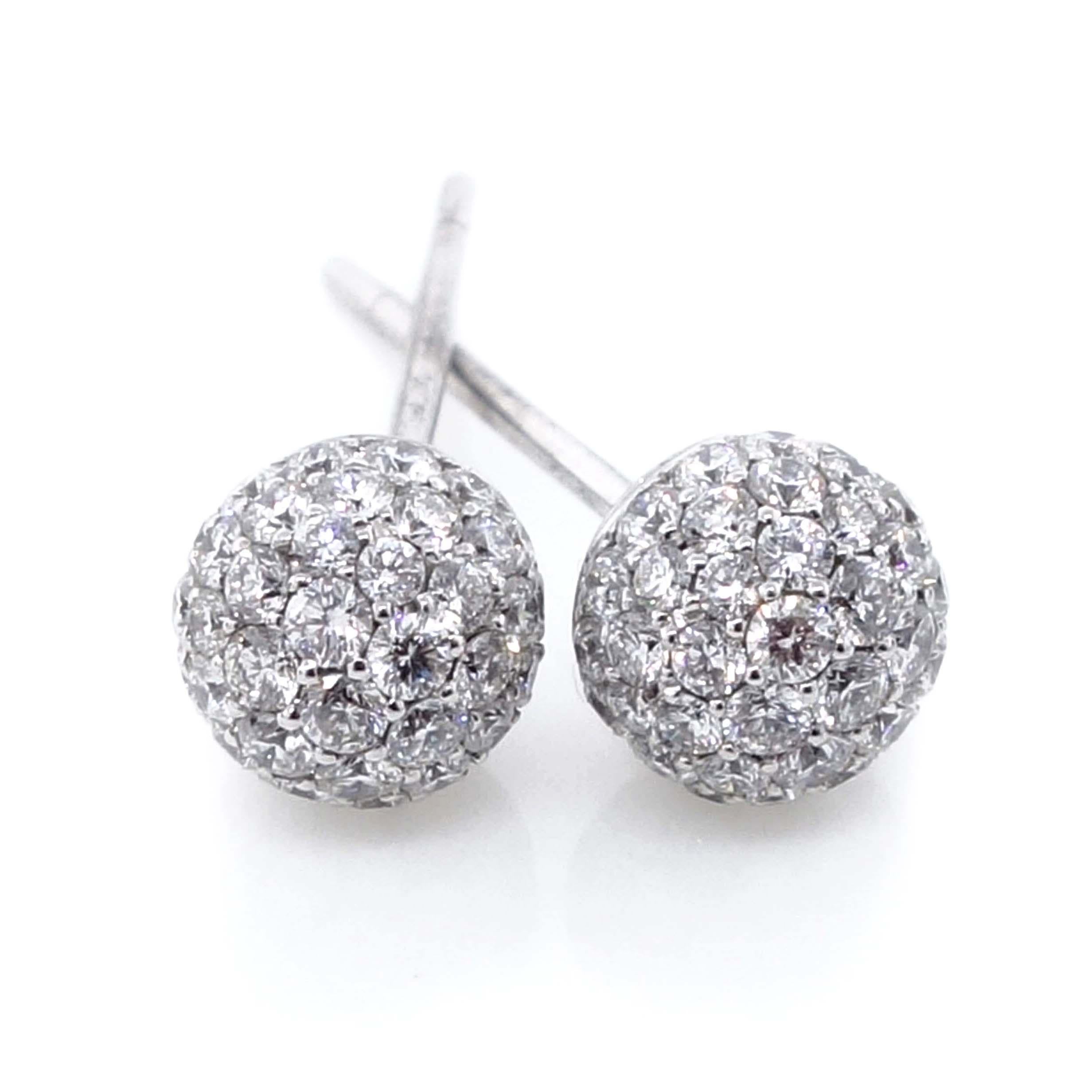Diamond Earrings containing 110 round brilliant cut diamonds of about 0.70 carats with a clarity of VS and color G. All diamonds are set in 18k white gold. Total weight of the earrings is approximately 2.63 grams.
Measurements: W 0.25 x H 0.25 inch

