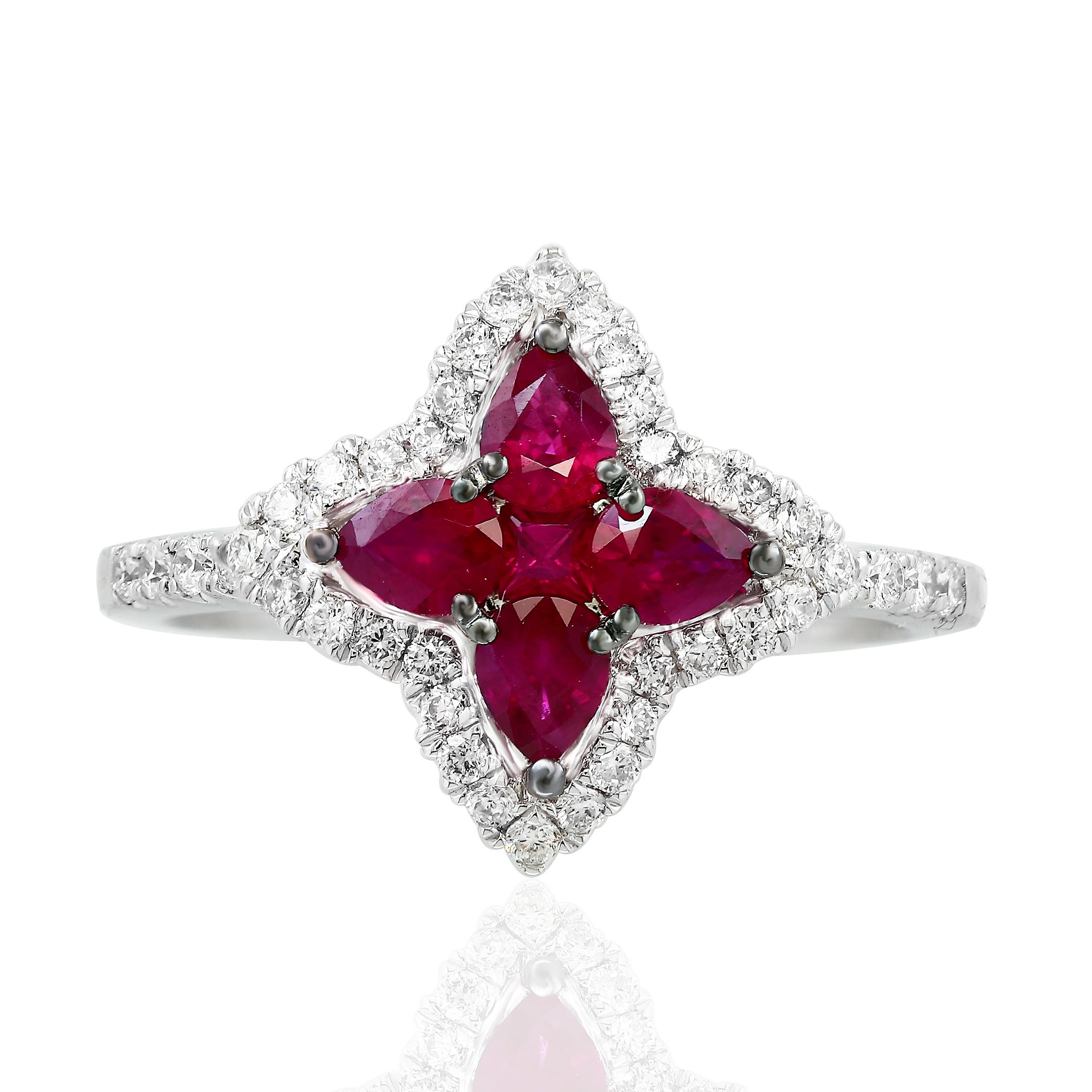 Showcasing flower design color-rich ring with 4 pear shape ruby weighing 0.70 carats total and 1 round shape ruby weighing 0.06 carat, accented by a row of round brilliant diamonds. Diamonds weigh 0.35 carats total. Set in a polished 18K white gold