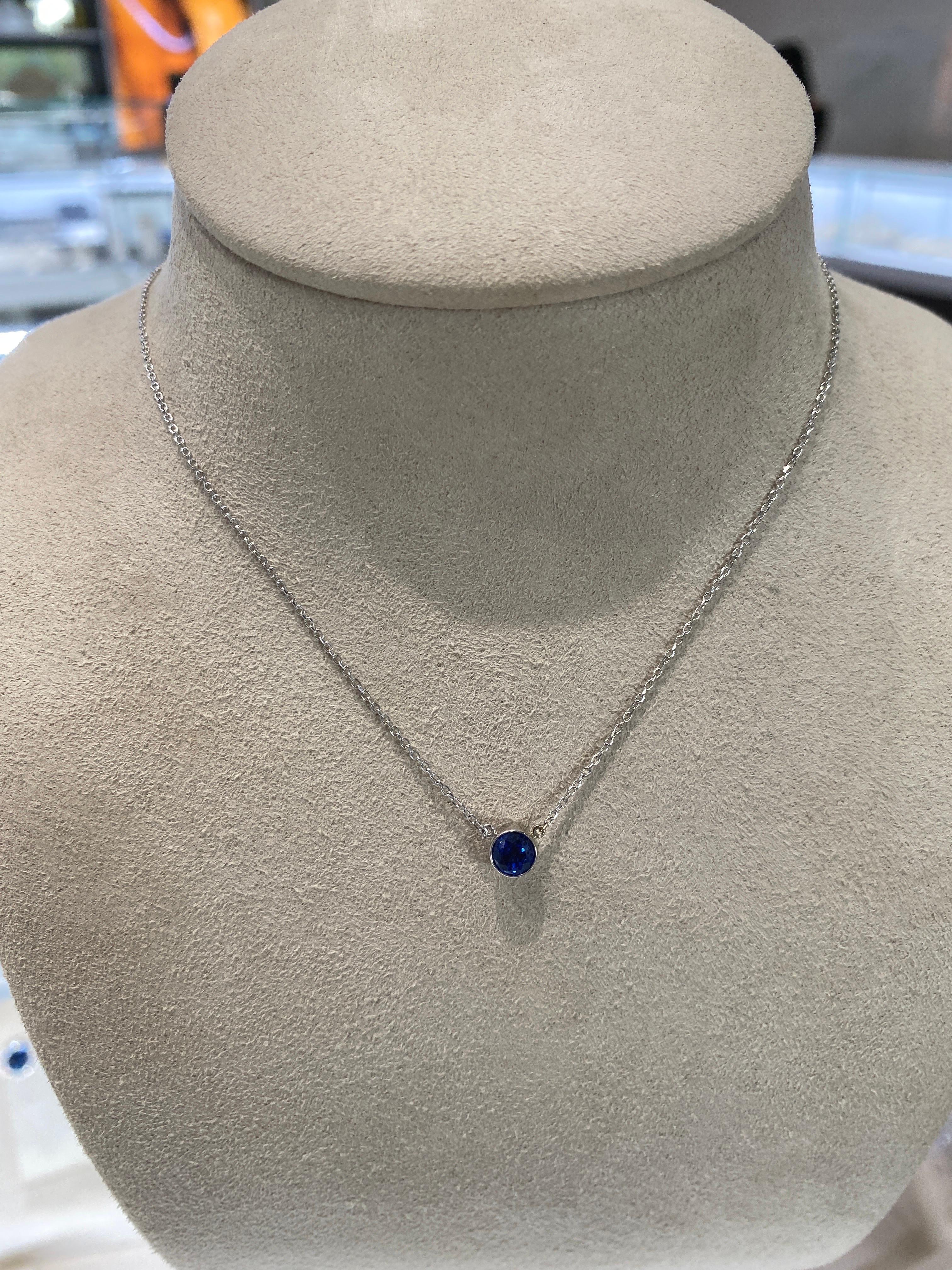 0.70 Carat Round Blue Sapphire Bezel Set 14 Karat White Gold Pendant Necklace In New Condition In Houston, TX