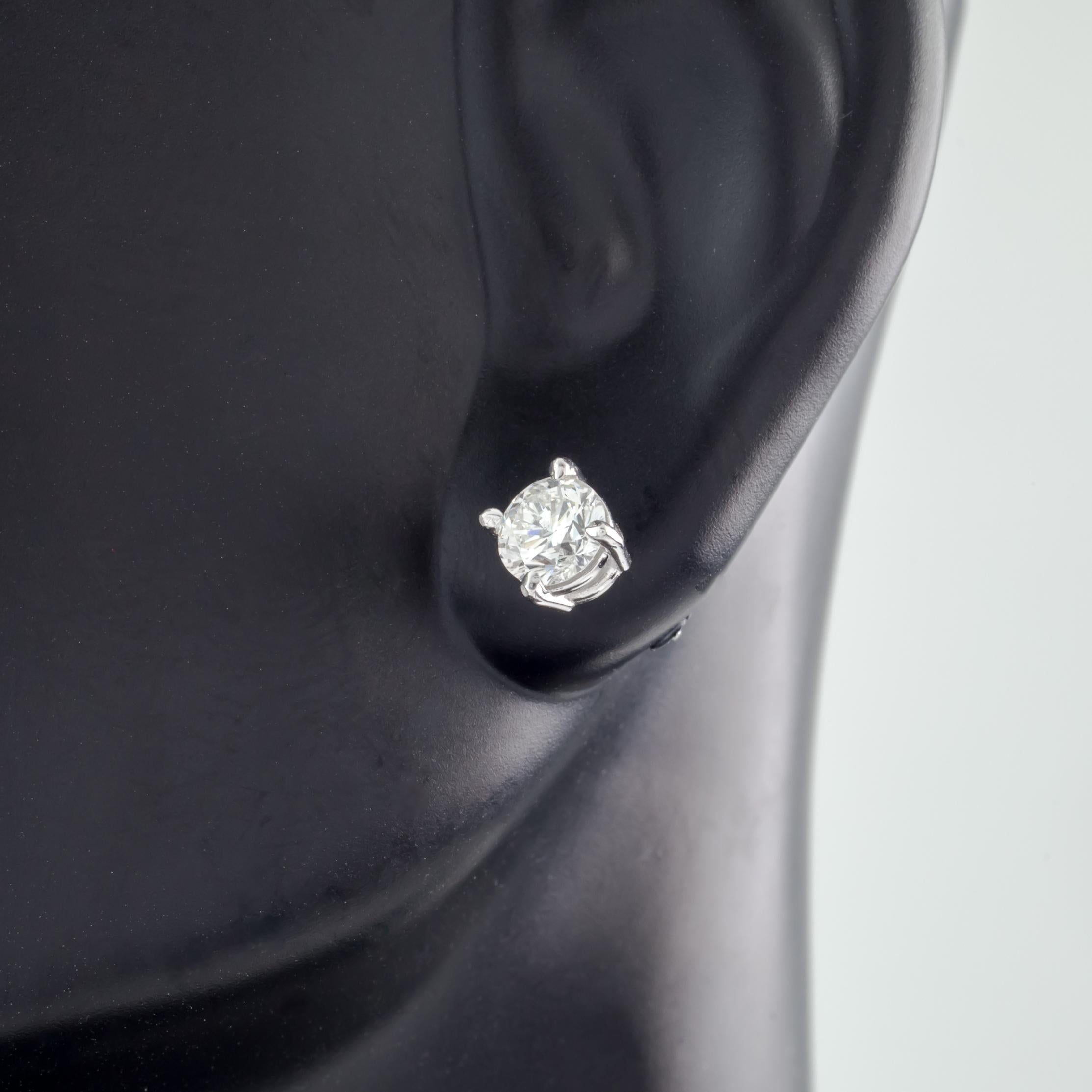 Round Cut 0.70 Carat Round Brilliant Diamond Stud Earrings in 14 Karat White Gold