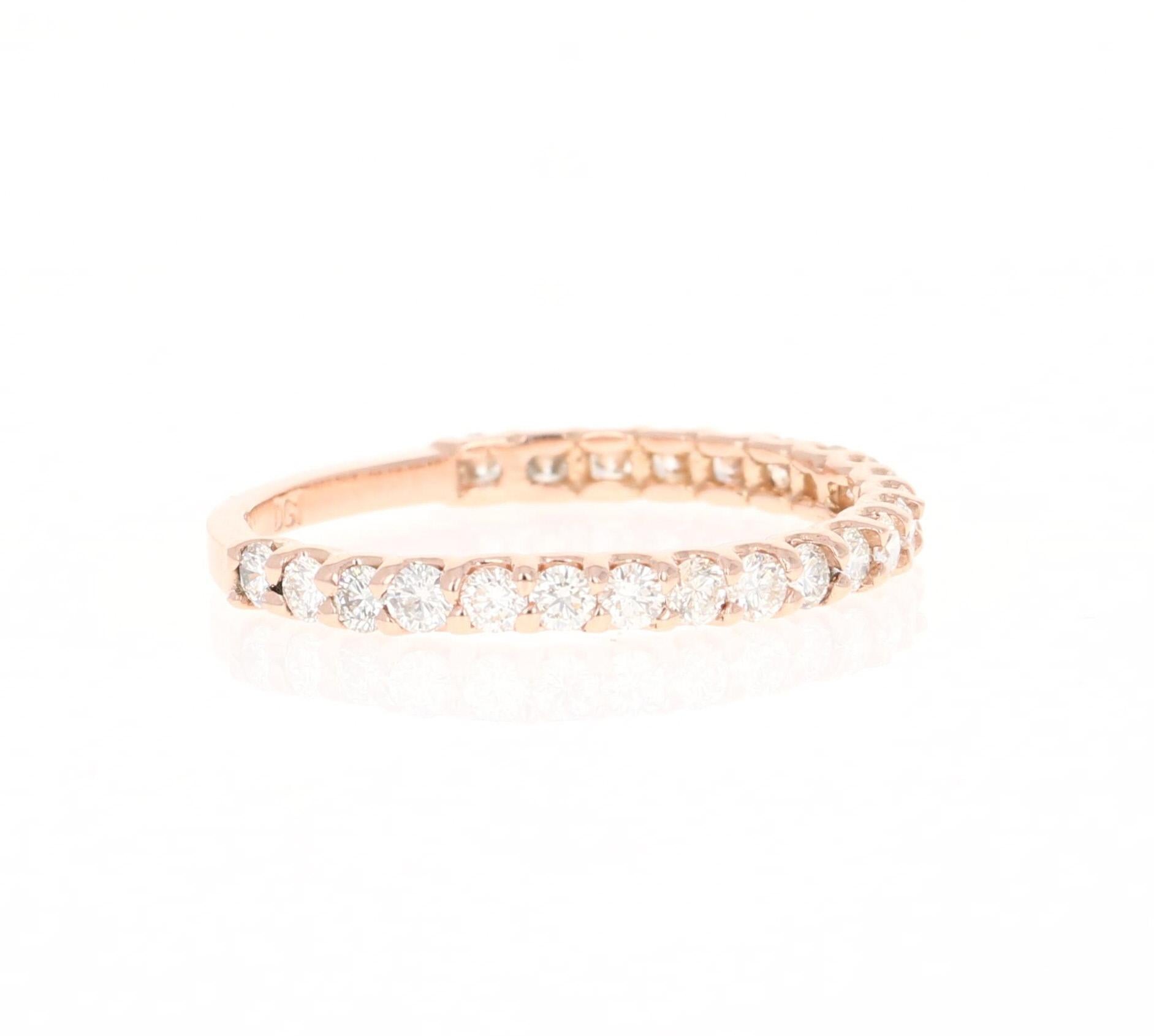 A beautiful band that can be worn as a single band or stacked with other bands in other colors of Gold

This ring has 23 Round Cut Diamonds that weigh 0.70 Carats. The clarity and color of the diamonds are VS-H

Crafted in 14 Karat Rose Gold and is