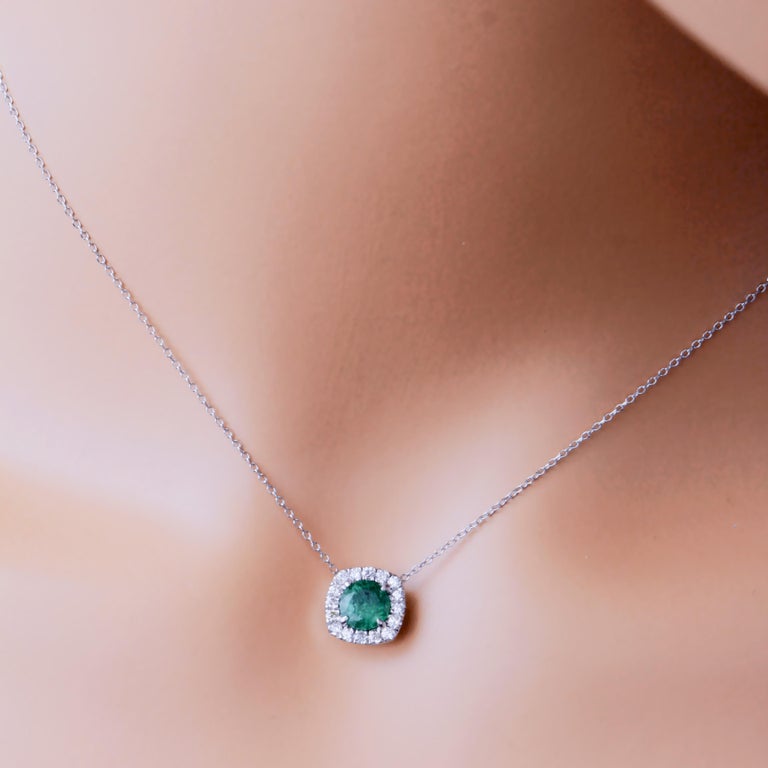 Women's 0.70 Carat Round Cut Emerald Pendant in Diamond Halo in 14k White Gold For Sale