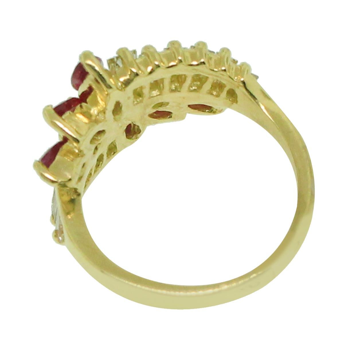 Material: 18k Yellow Gold
Gemstone Details: Approximately 0.70ctw marquise shapes ruby gemstones
Diamond Details: Approximately 0.80 baguette diamonds. Diamonds are J/K in color and SI1 in clarity.
Ring Size: 6 (can be sized)
Total Weight: 7.4g