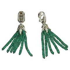 0.70 Carats Diamonds, Emeralds White Gold Drop Earrings