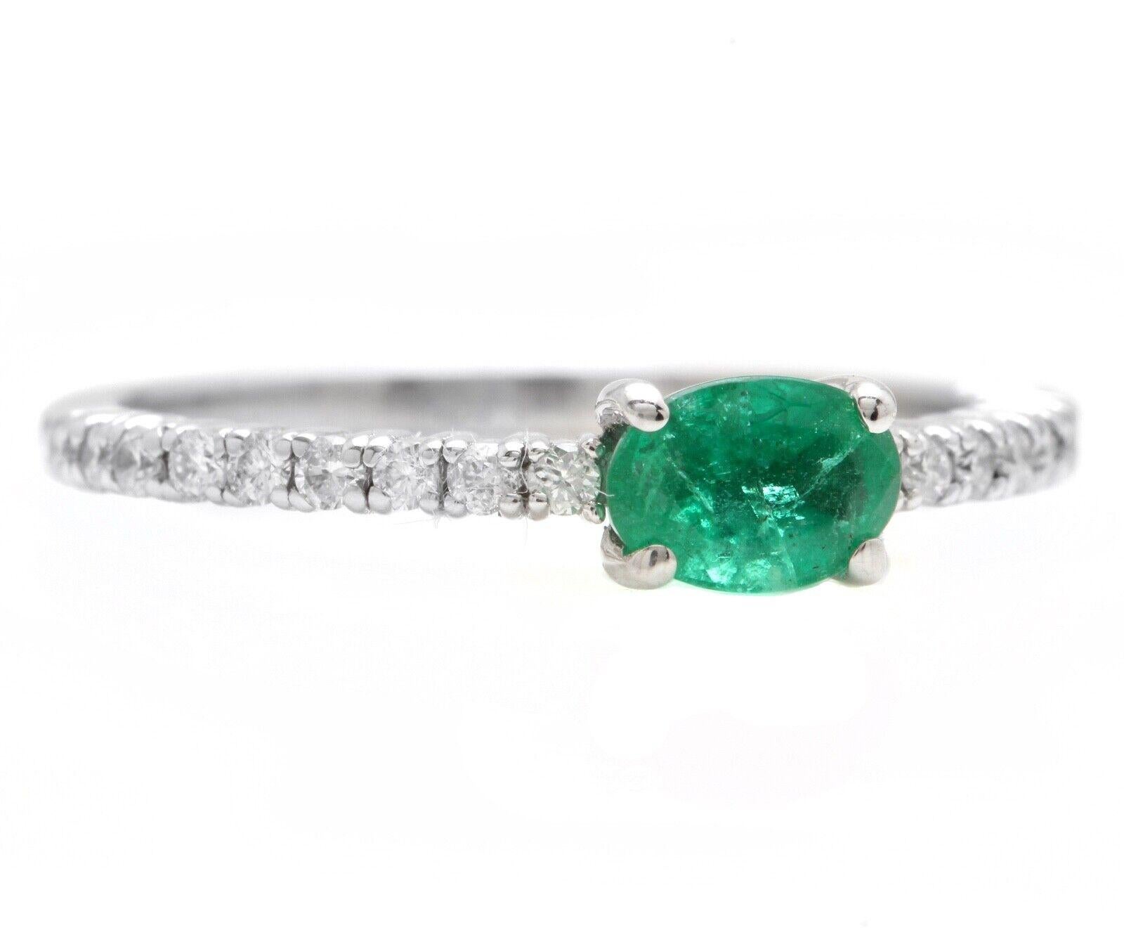 0.70 Carats Natural Emerald and Diamond 14K Solid White Gold Ring

Suggested Replacement Value: $3,000.00

Total Natural Green Emerald Weight is: Approx. 0.50 Carats 

Natural Round Diamonds Weight: Approx. 0.20 Carats (color G-H / Clarity SI)

Ring
