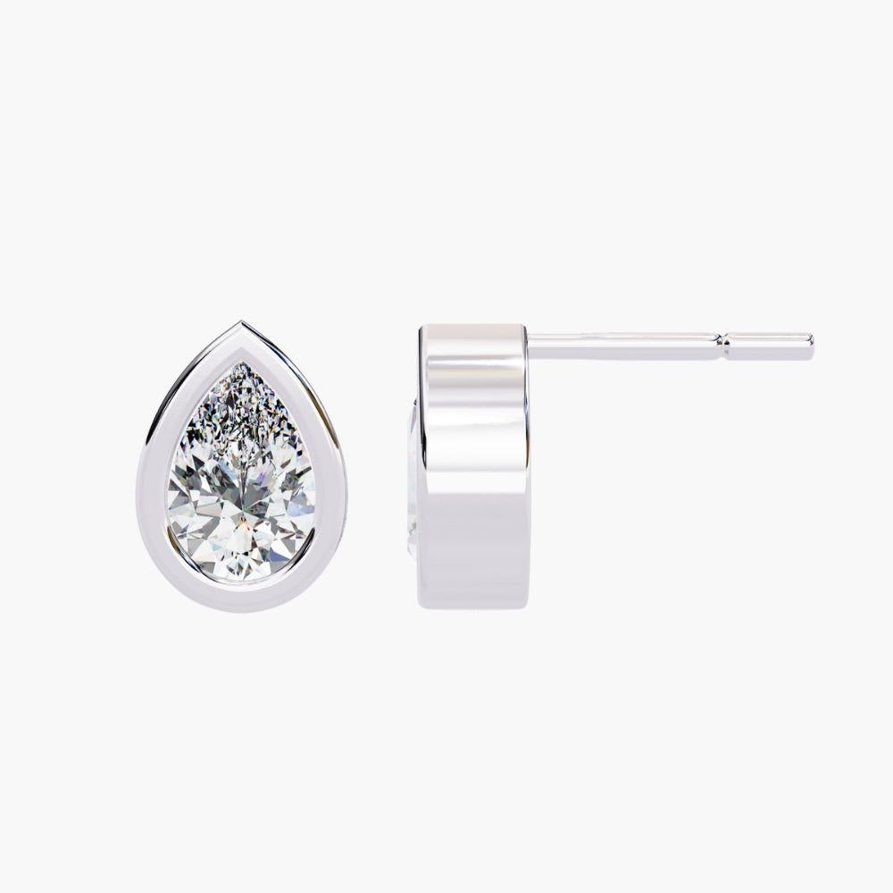 Contemporary 0.70 Ctw Pear-Shaped Diamond Stud Earrings 14K Gold For Sale
