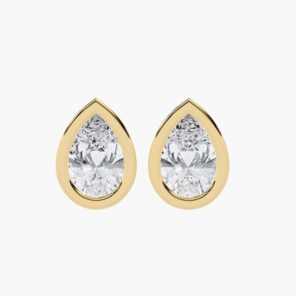 Women's 0.70 Ctw Pear-Shaped Diamond Stud Earrings 14K Gold For Sale