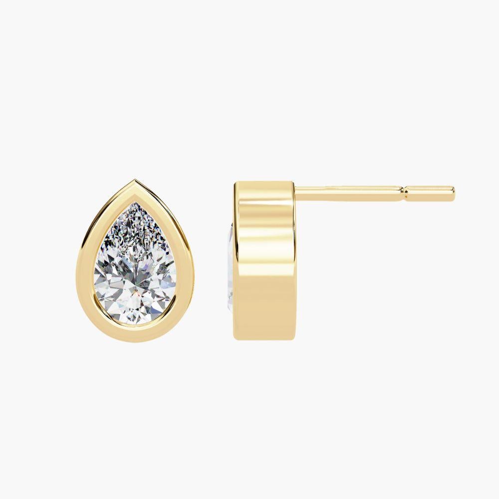 0.70 Ctw Pear-Shaped Diamond Stud Earrings 14K Gold For Sale 1