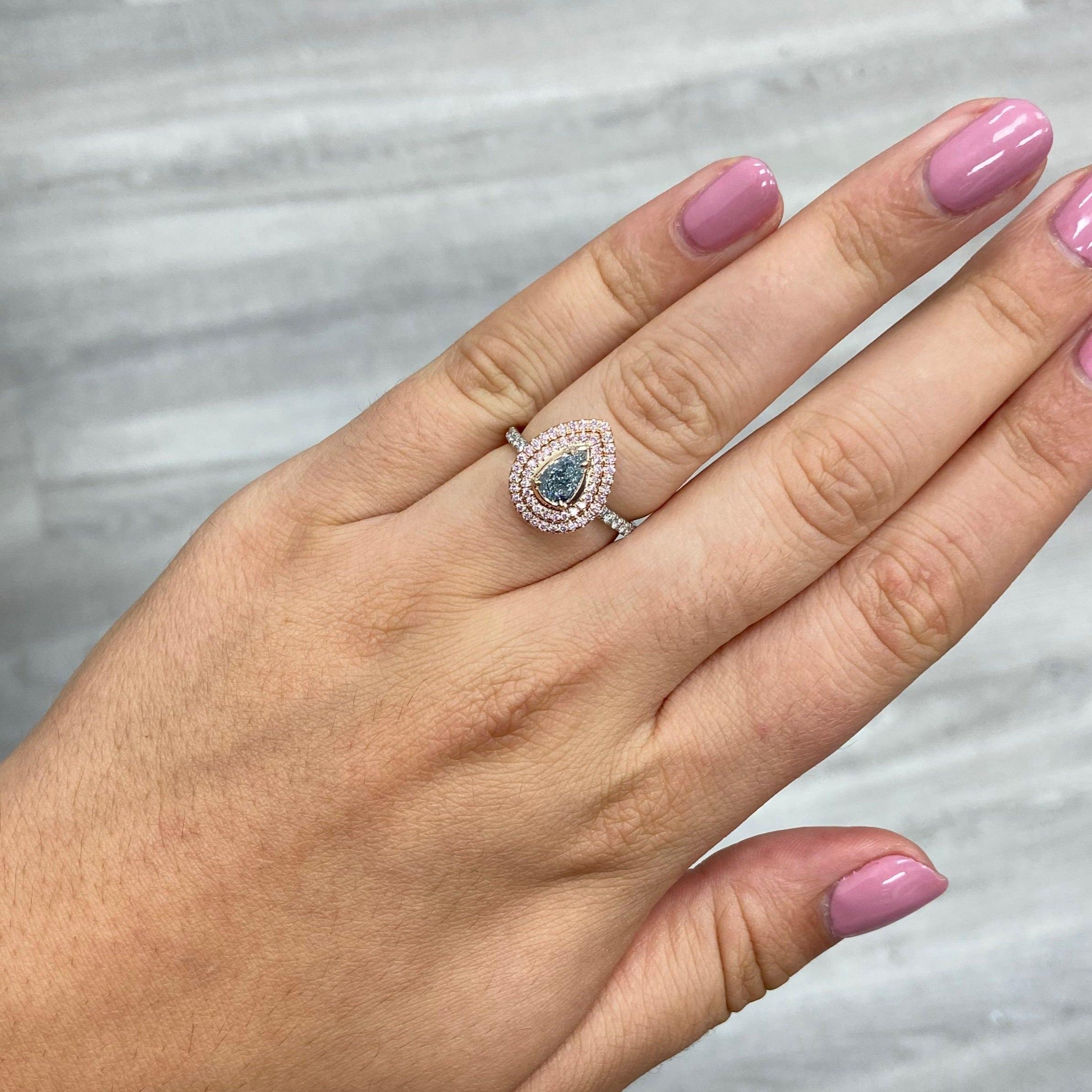 Pear Cut 0.70ct GIA Fancy Light Blue Pear Diamond Ring For Sale