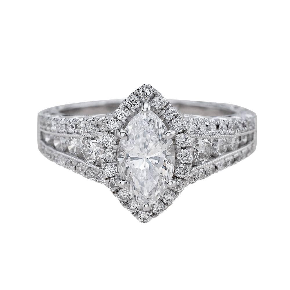 - Center Stone: Marquise Cut Diamond 0.70ct G SI1
- Side Stones: Round Cut Diamonds 1.75ctw / Graded G SI1
- Metal: 14K White Gold

This piece is made-to-order. Please allow up to 7 Business Days to accomplish.