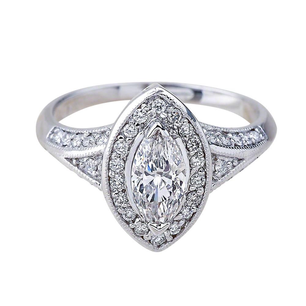 - Center Stone: Marquise Cut Diamond 0.70ct G SI1
- Side Stones: Round Cut Diamonds 0.40ctw / Graded G SI1
- Metal: 14K White Gold

This piece is made-to-order. Please allow up to 7 Business Days to accomplish.
