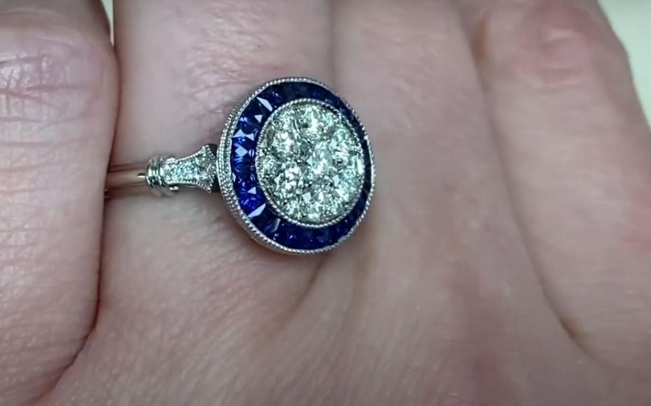 0.70ct Round Brilliant Cut Diamond Engagement Ring, Sapphire Halo, Platinum In Excellent Condition For Sale In New York, NY