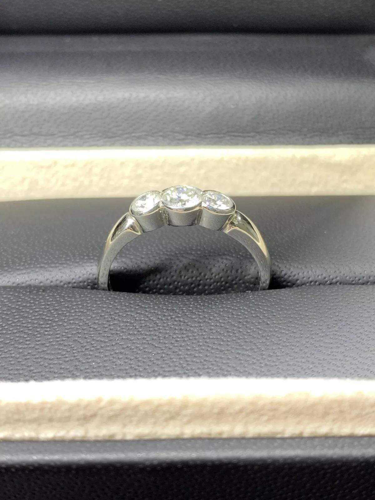0.70ct round diamond trilogy engagement ring in platinum. In New Condition For Sale In London, GB
