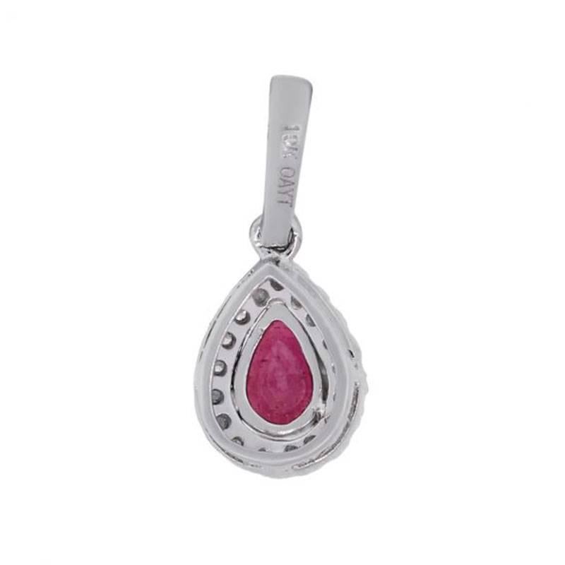 Style: Ruby diamond pendant
Material: 14k white gold
Gemstone Details: Approximately 0.70ct ruby gemstone
Diamond Details: Approximately 0.12ctw round brilliant diamonds. Diamonds are G/H in color and SI in clarity.
Pendant Measurements: 0.61″ x
