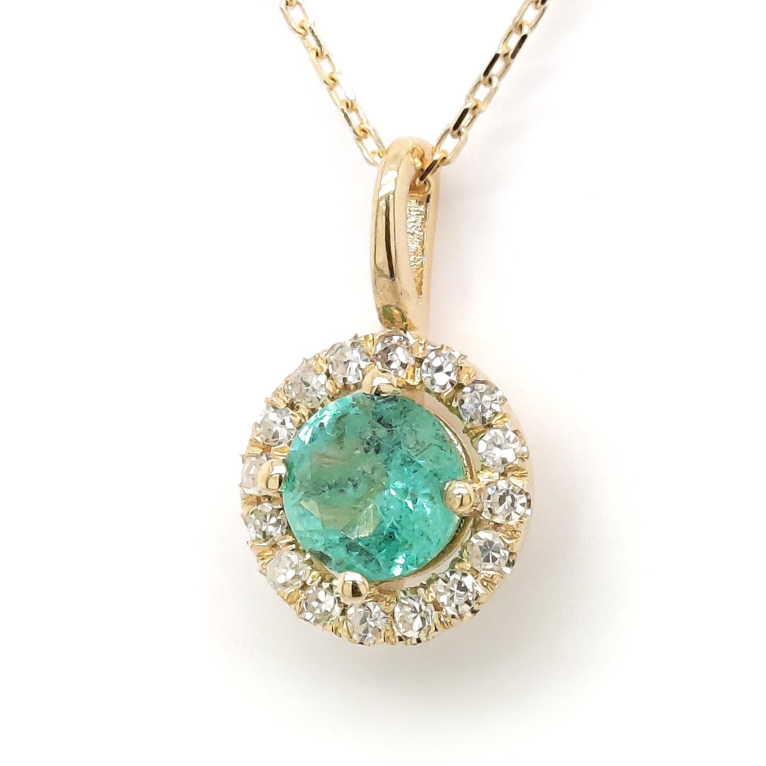 FOR U.S. BUYERS NO VAT 

This amazing 14kt Yellow gold pendant featuring a gorgeous emerald 0.55 carats and surrounded by 16 round brilliant diamonds. This beautiful color combination will immediately win your heart. 
For more information, please