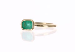 0.70cts 10K Bezel Set Colombian Emerald Solitaire Ring
