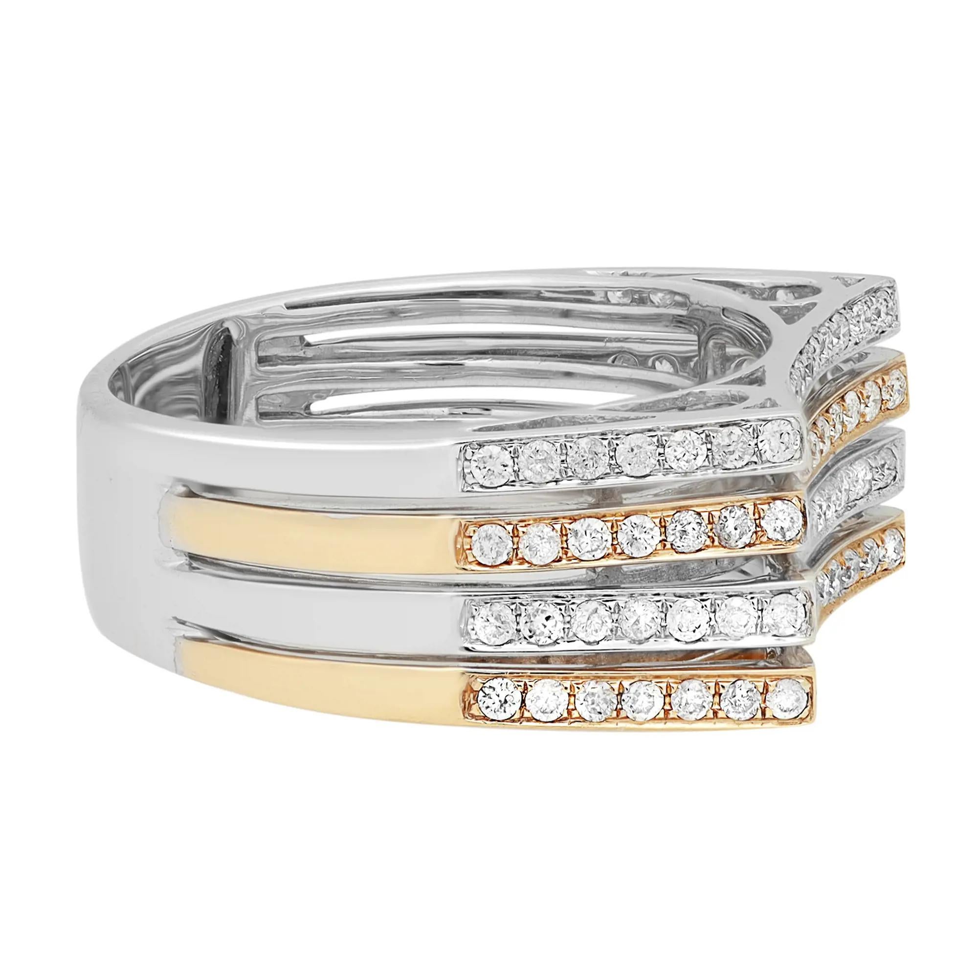 Dieser elegante und klassische Diamantring ist aus 14 Karat Weiß- und Gelbgold gefertigt. Vier Reihen mit runden Diamanten im Brillantschliff mit einem Gewicht von 0.70 Karat in Pflastertechnik. Farbe des Diamanten I und Reinheit SI -I. Ringbreite:
