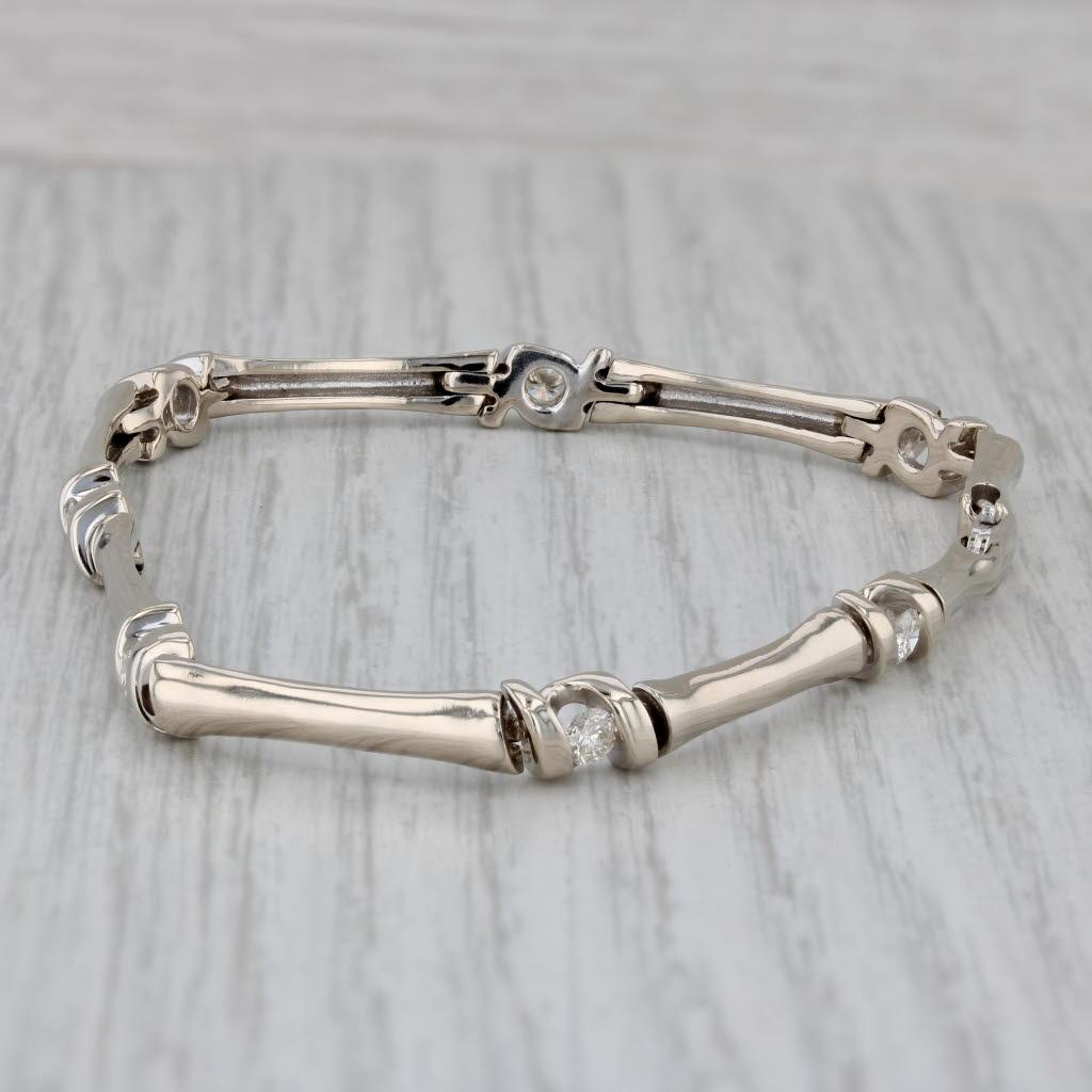Gemstone Information:
- Natural Diamonds -
Total Carats - 0.70ctw
Cut - Round Brilliant
Color - I - L
Clarity - I1

Metal: 14k White Gold
Weight: 14.4 Grams 
Stamps: 14k
Chain Style: Bamboo Link
Closure: Lobster Clasp
Inner Circumference: 7