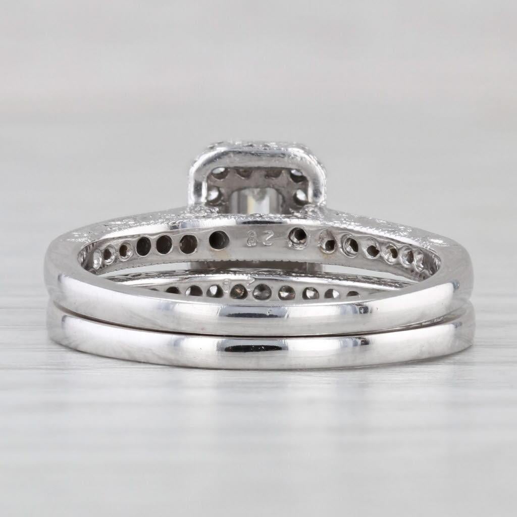 Taglio smeraldo Anello di fidanzamento aureolato con diamante taglio smeraldo da 0,70 ct. in oro bianco 14 ct. in vendita