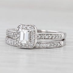 Anello di fidanzamento aureolato con diamante taglio smeraldo da 0,70 ct. in oro bianco 14 ct.