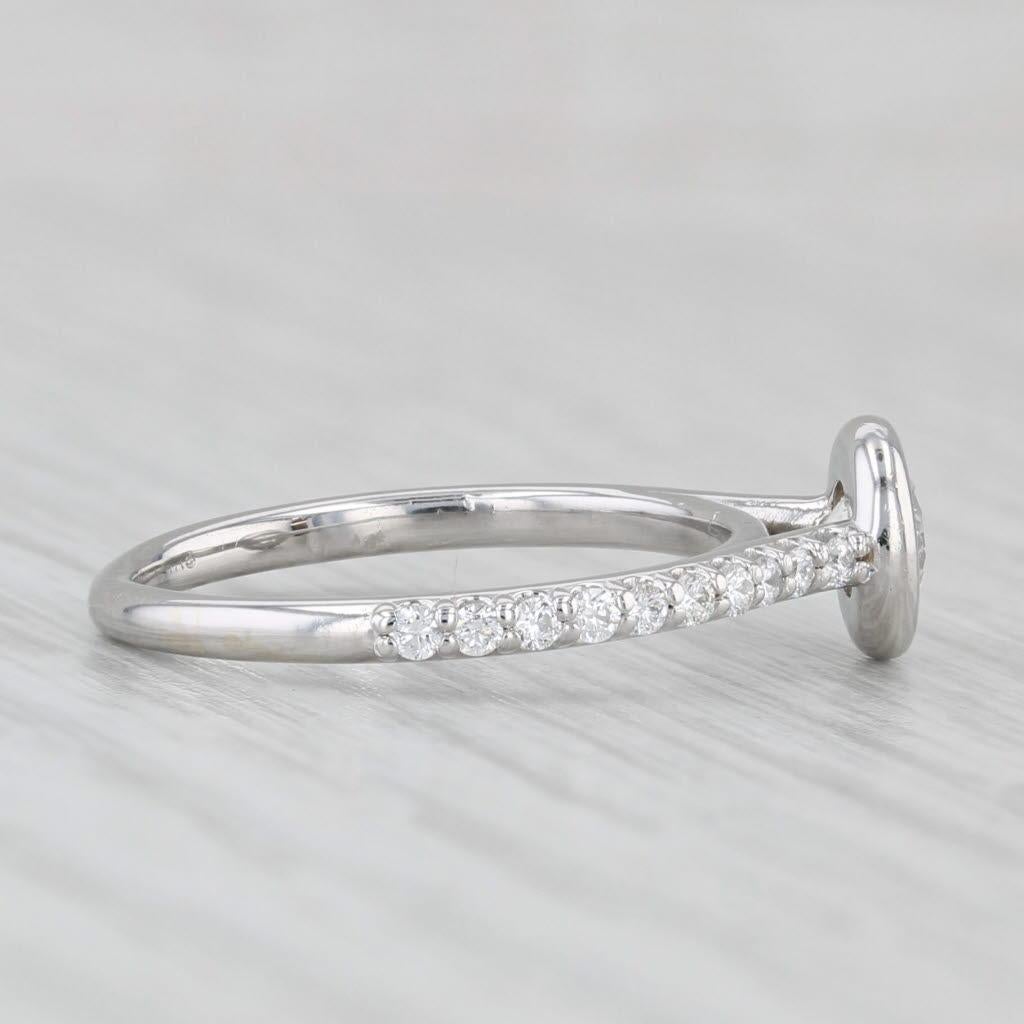 Gemstone Information:
- Natural Diamond -
Carats - 0.47ct 
Cut - Round Brilliant
Color - H - I
Clarity - SI1 

- Natural Diamonds -
Total Carats - 0.23ctw
Cut - Round Brilliant
Color - F - K
Clarity - SI1 - SI2

Metal: 14k White Gold
Weight: 1.9