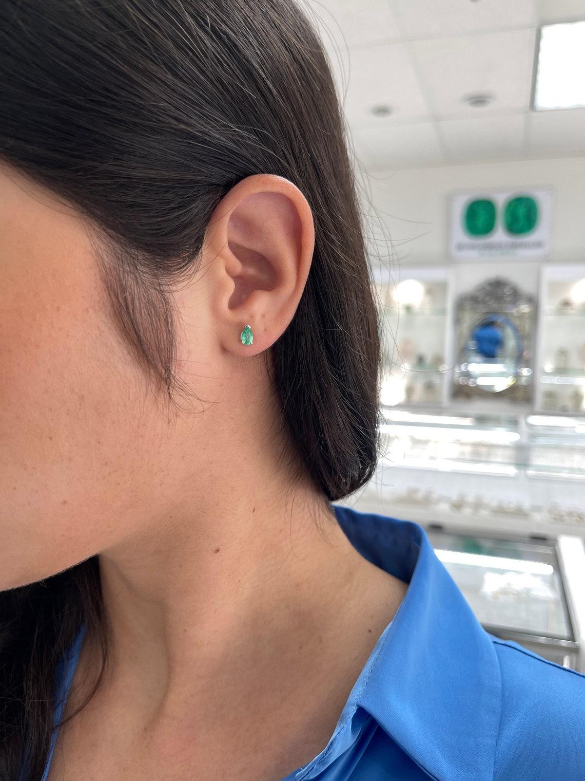 Modern 0.70tcw 14K Pear Cut Light Green Emerald Studs 3 Prong White Gold Emerald For Sale