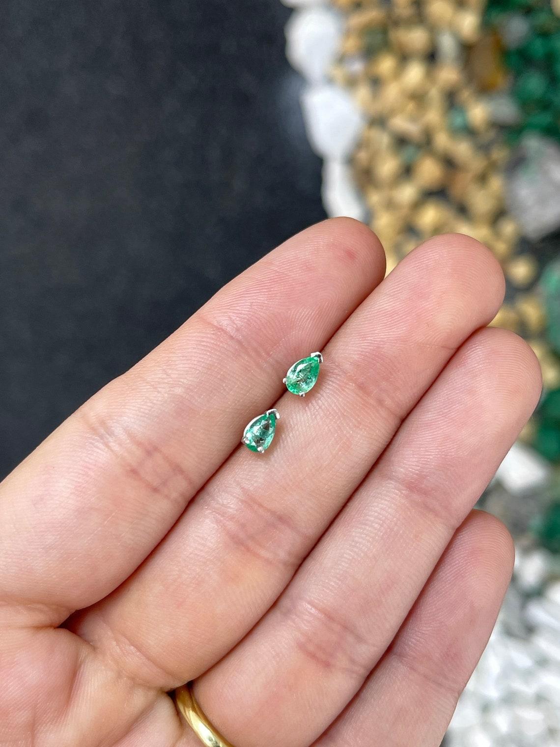 0.70tcw 14K Pear Cut Light Green Emerald Studs 3 Prong White Gold Emerald In New Condition For Sale In Jupiter, FL