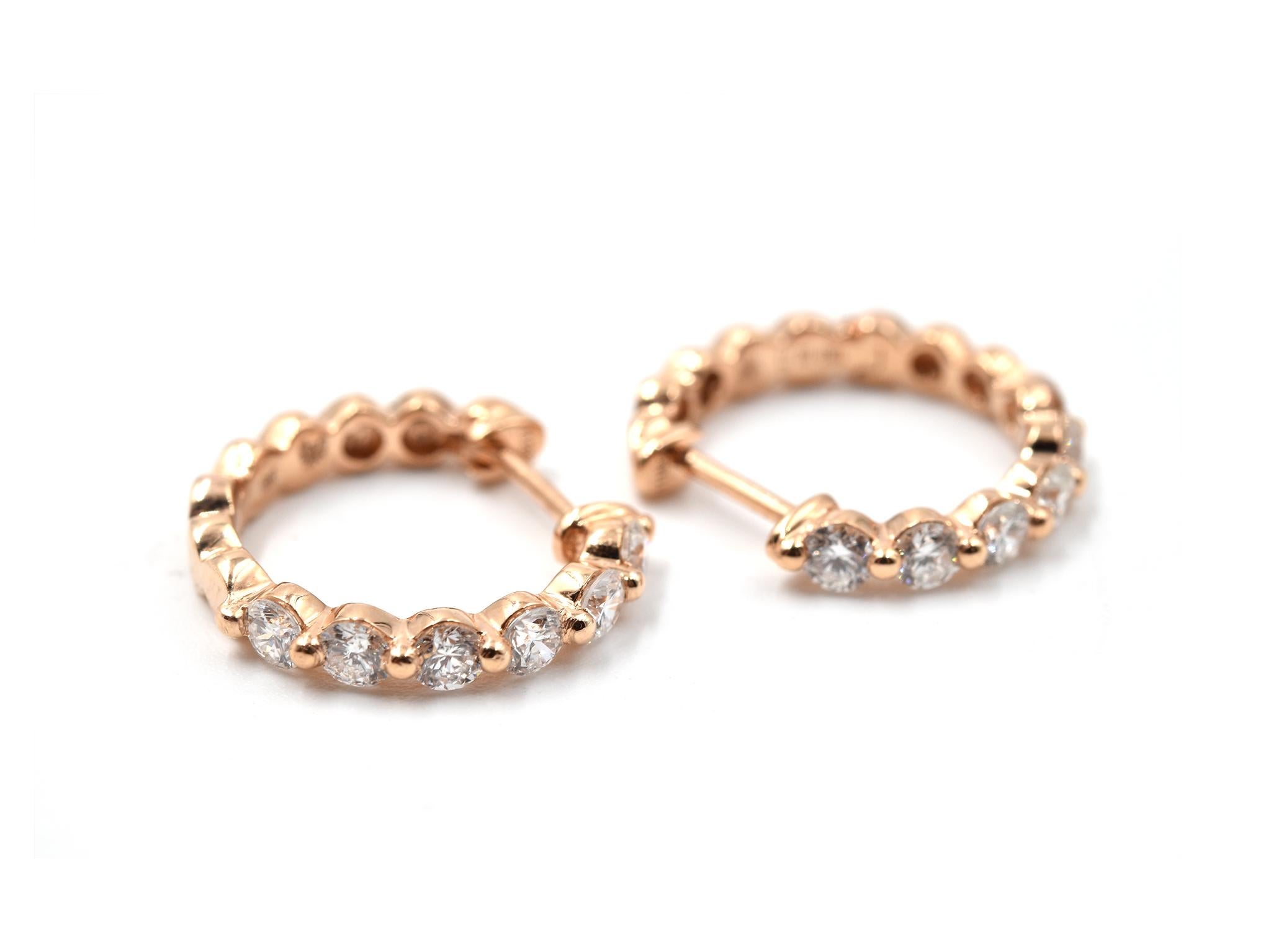 Designer: custom design
Material: 18k rose gold
Diamonds: 0.71 carat weight
Color: G
Clarity: SI1
Dimensions: each earring is 1/2-inch diameter
Fastenings: snap closure
Weight: 2.75 grams
