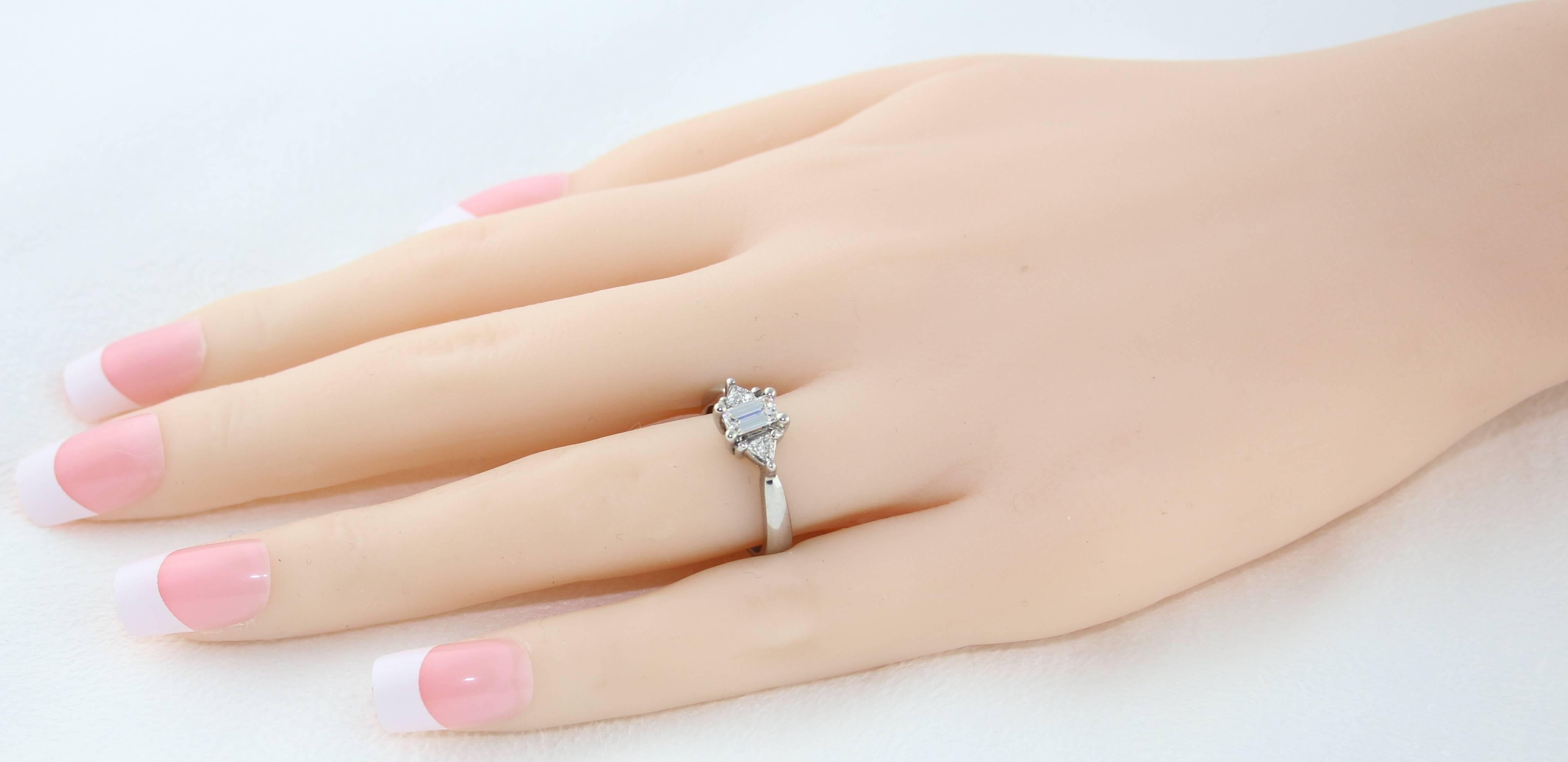 Contemporary 0.71 Carat Emerald Cut Diamond Three-Stone Gold Ring