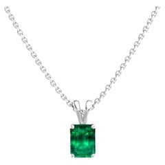 0.71 Carat Emerald Cut Emerald Pendant in 14K