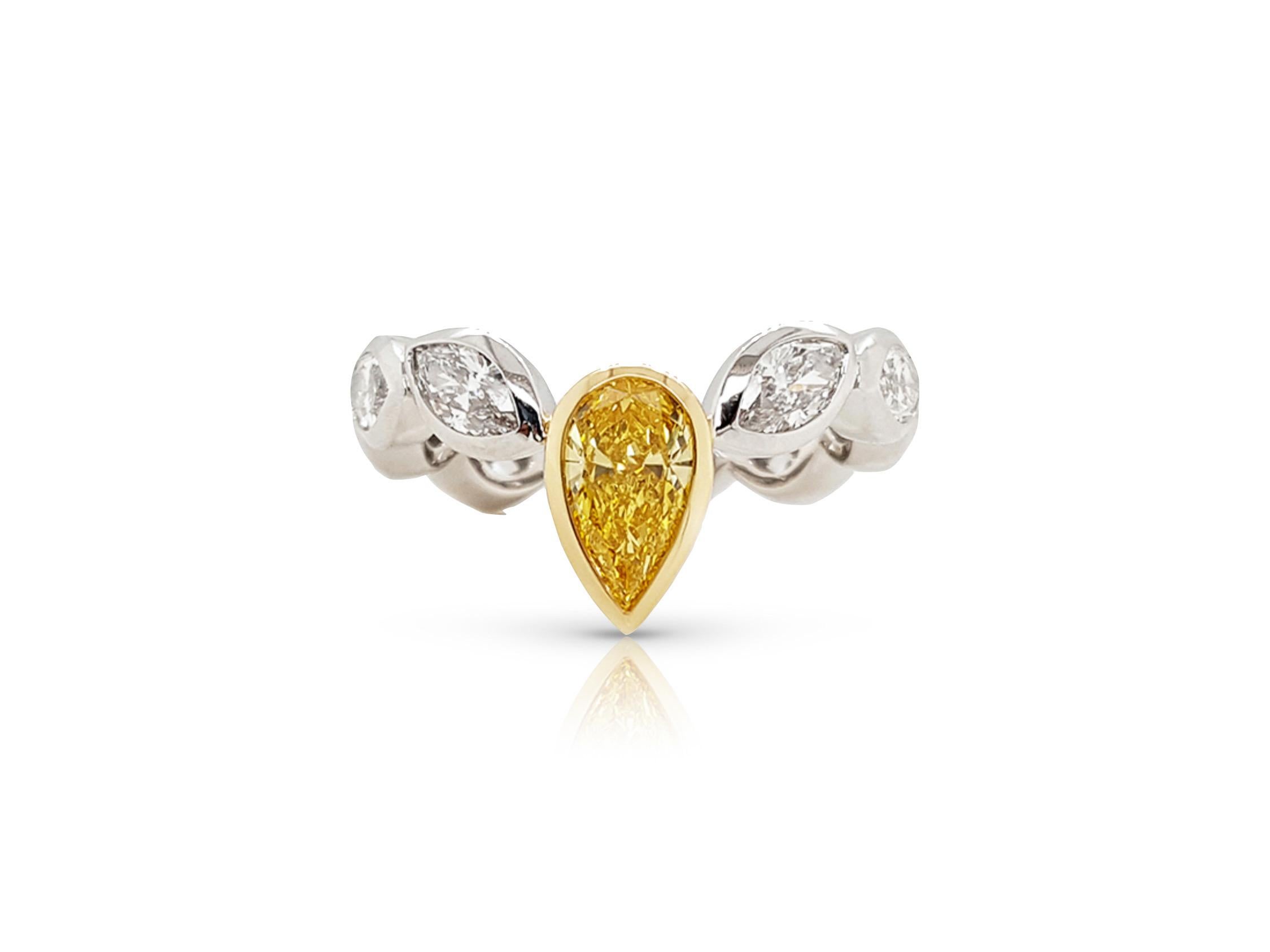 Novel Collection showcasing a unique and elegant engagement ring, 0.71 carat Fancy Vivid Yellow pear shape diamond certified by GIA as VS1 clarity. The center diamond is set in a delicate bezel setting giving it a unique and contemporary look.