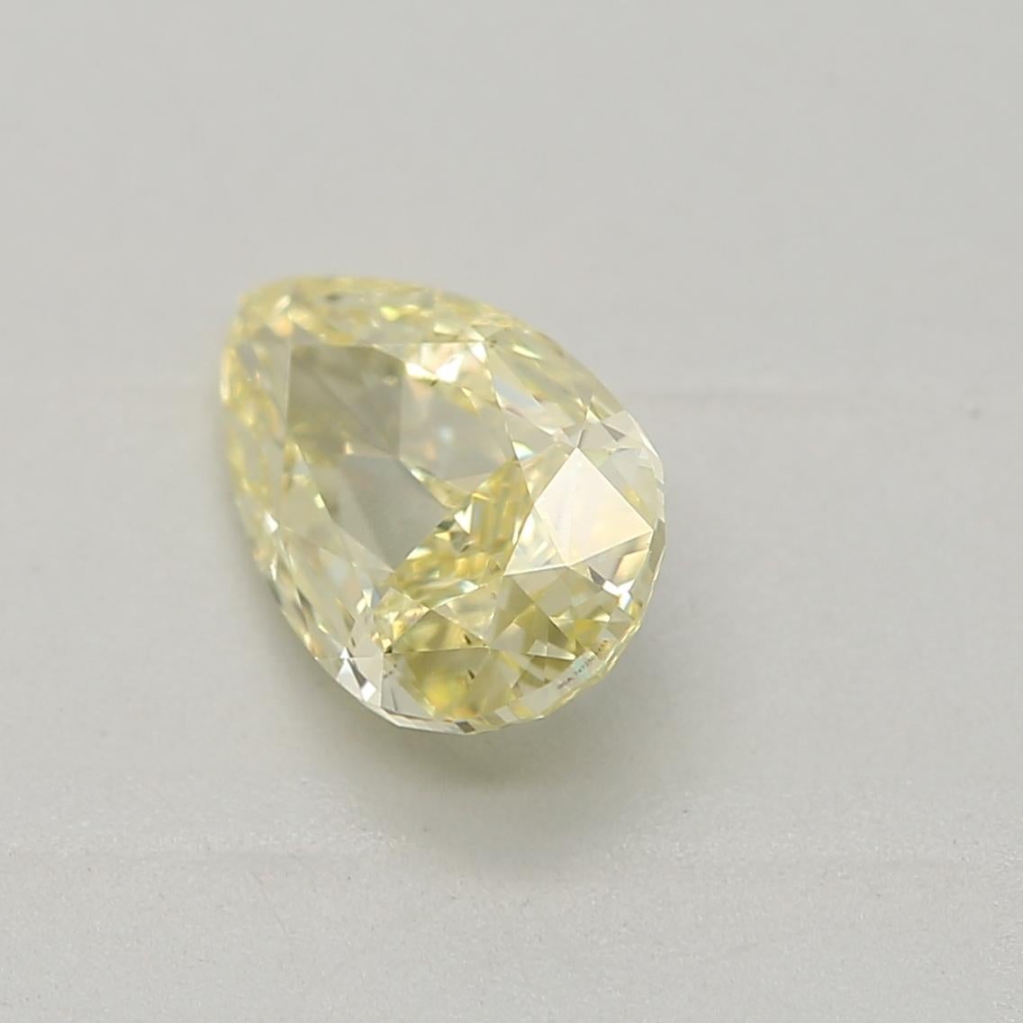 Pear Cut 0.71-CARAT, FANCY  YELLOW, CUT DIAMOND SI1 Clarity GIA Certified For Sale