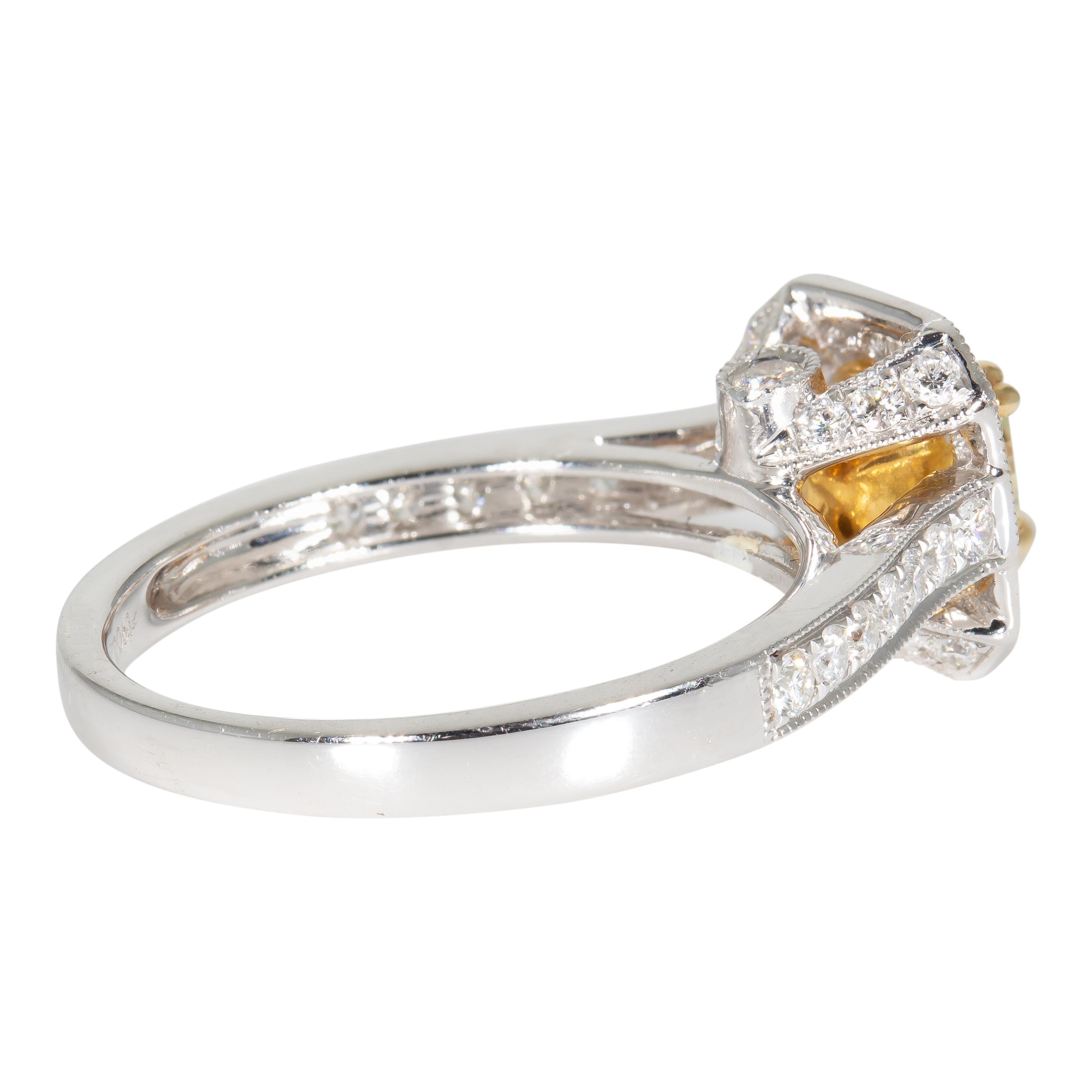 0.71 Carat Fancy Yellow Halo Diamond Ring In New Condition In Miami, FL