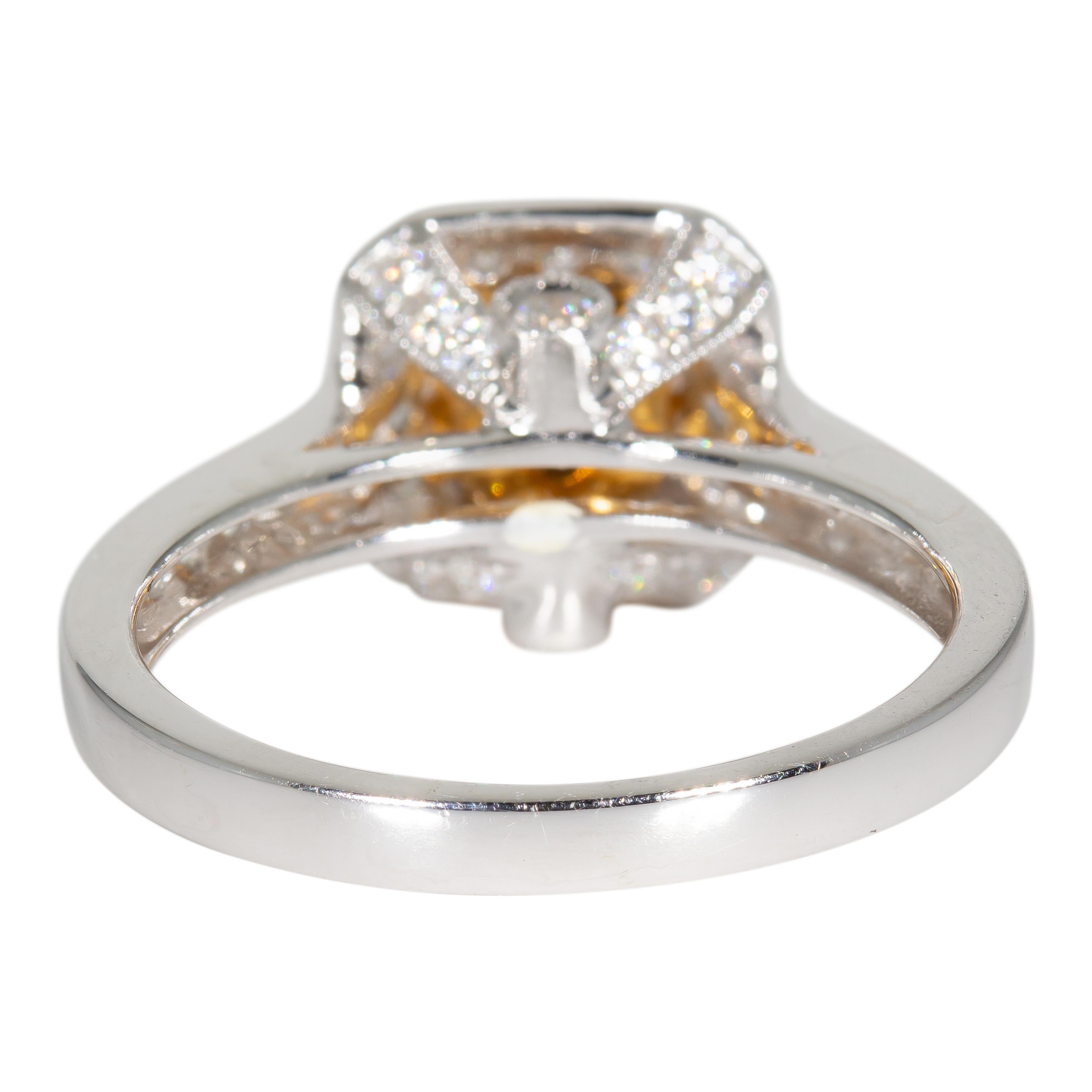 Women's 0.71 Carat Fancy Yellow Halo Diamond Ring
