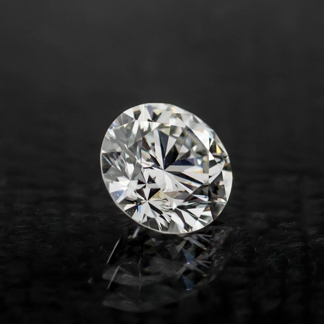 Modern 0.71 Carat Loose F / VS2 Round Brilliant Cut Diamond GIA Certified For Sale