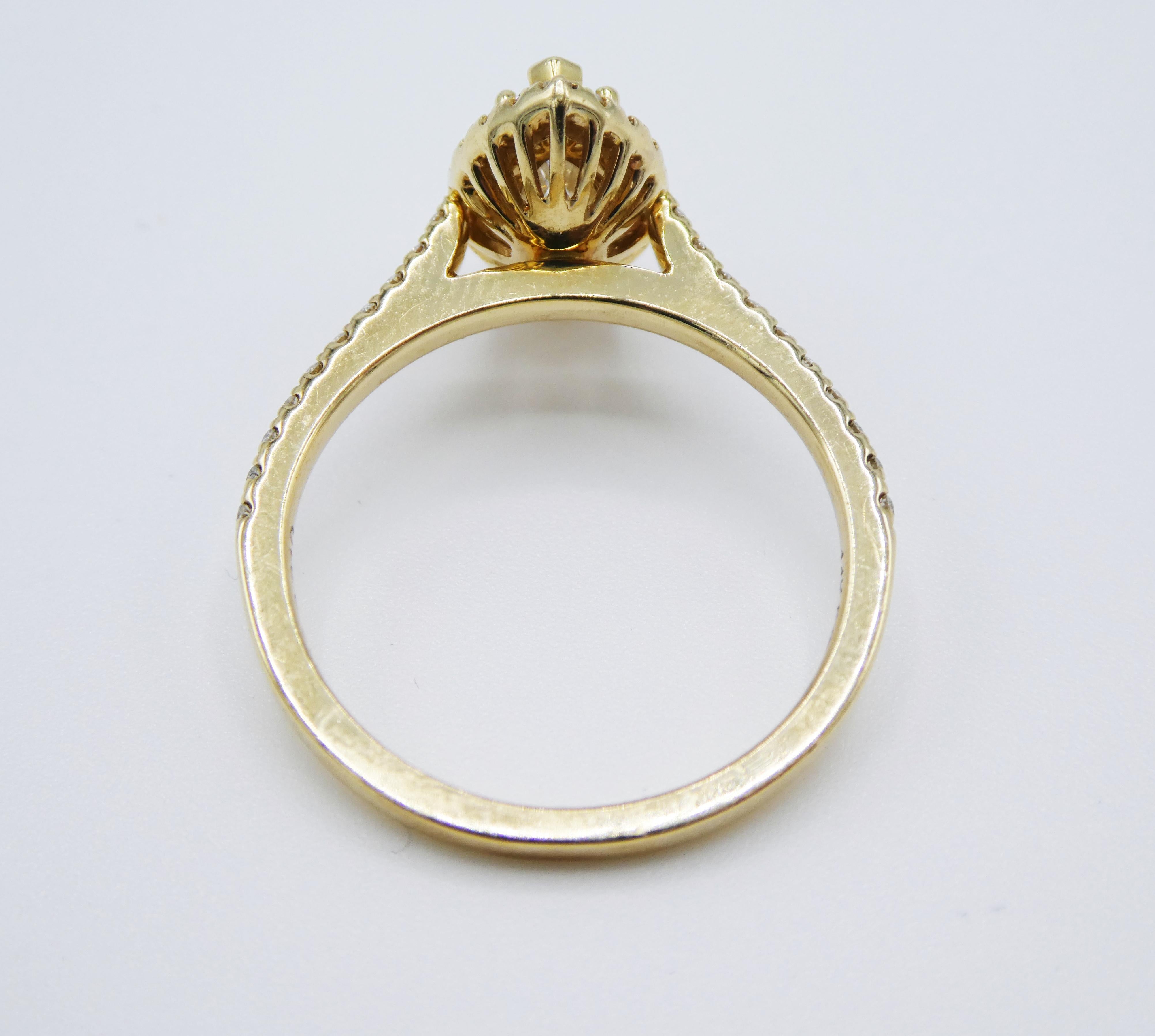 Women's 0.71 Carat Marquise 14 Karat Yellow Gold Halo Diamond Engagement Ring