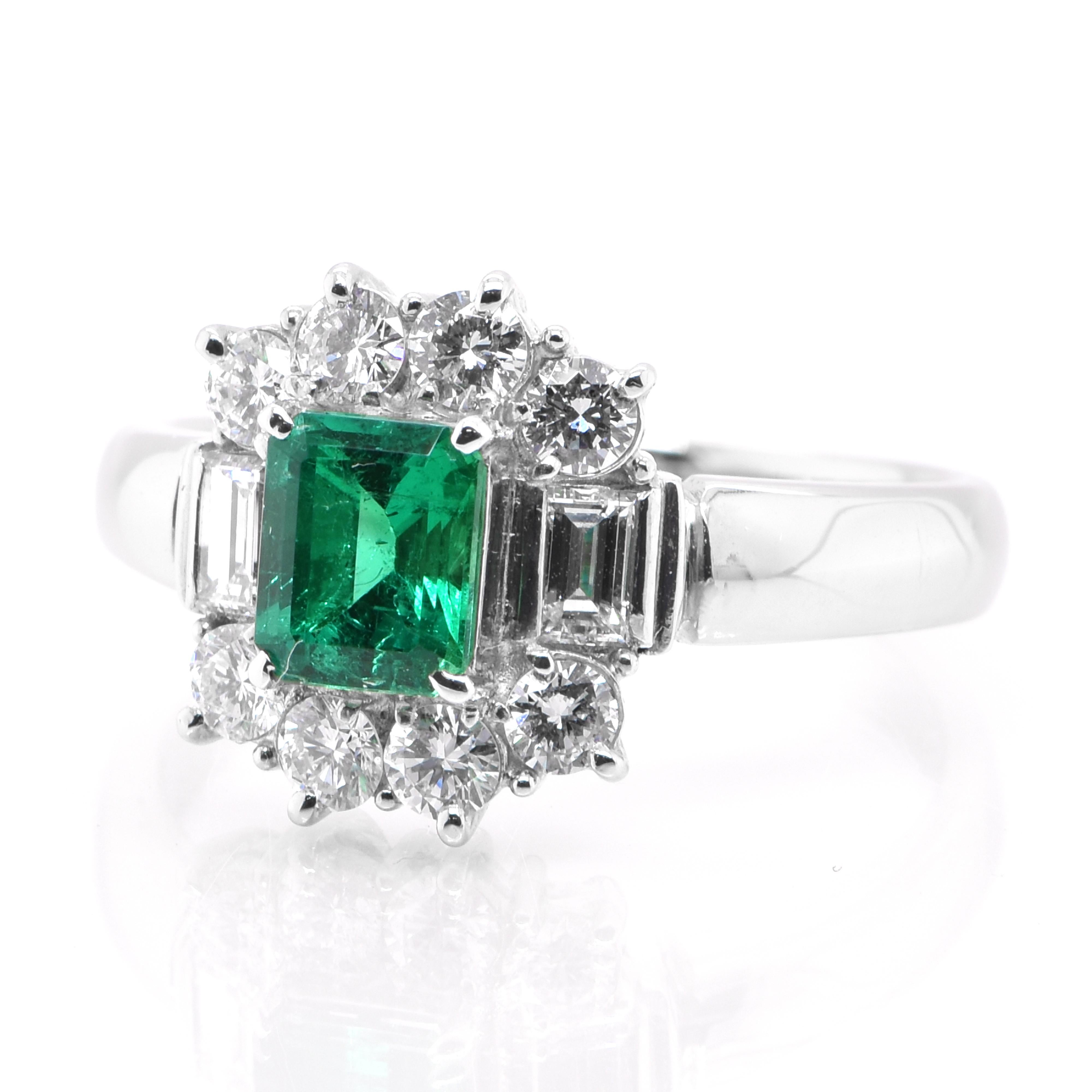 A stunning Halo ring featuring a 0.71 Carat, Natural, Emerald and 0.78 Carats of Diamond Accents set in Platinum. The Emerald displays exceptional color and clarity. People have admired emerald’s green for thousands of years. Emeralds have always