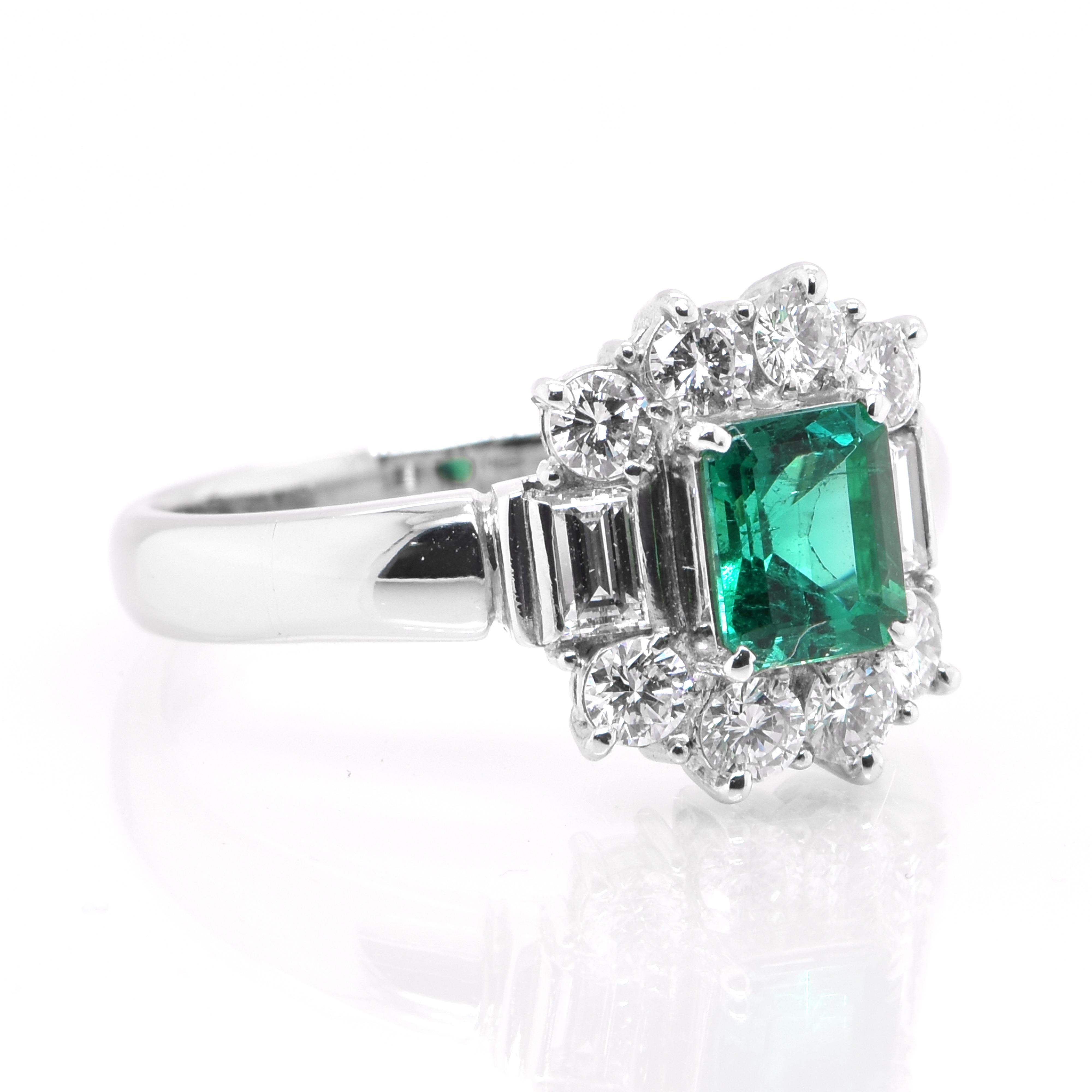 Modern 0.71 Carat Natural Emerald and Diamond Halo Ring Set in Platinum For Sale