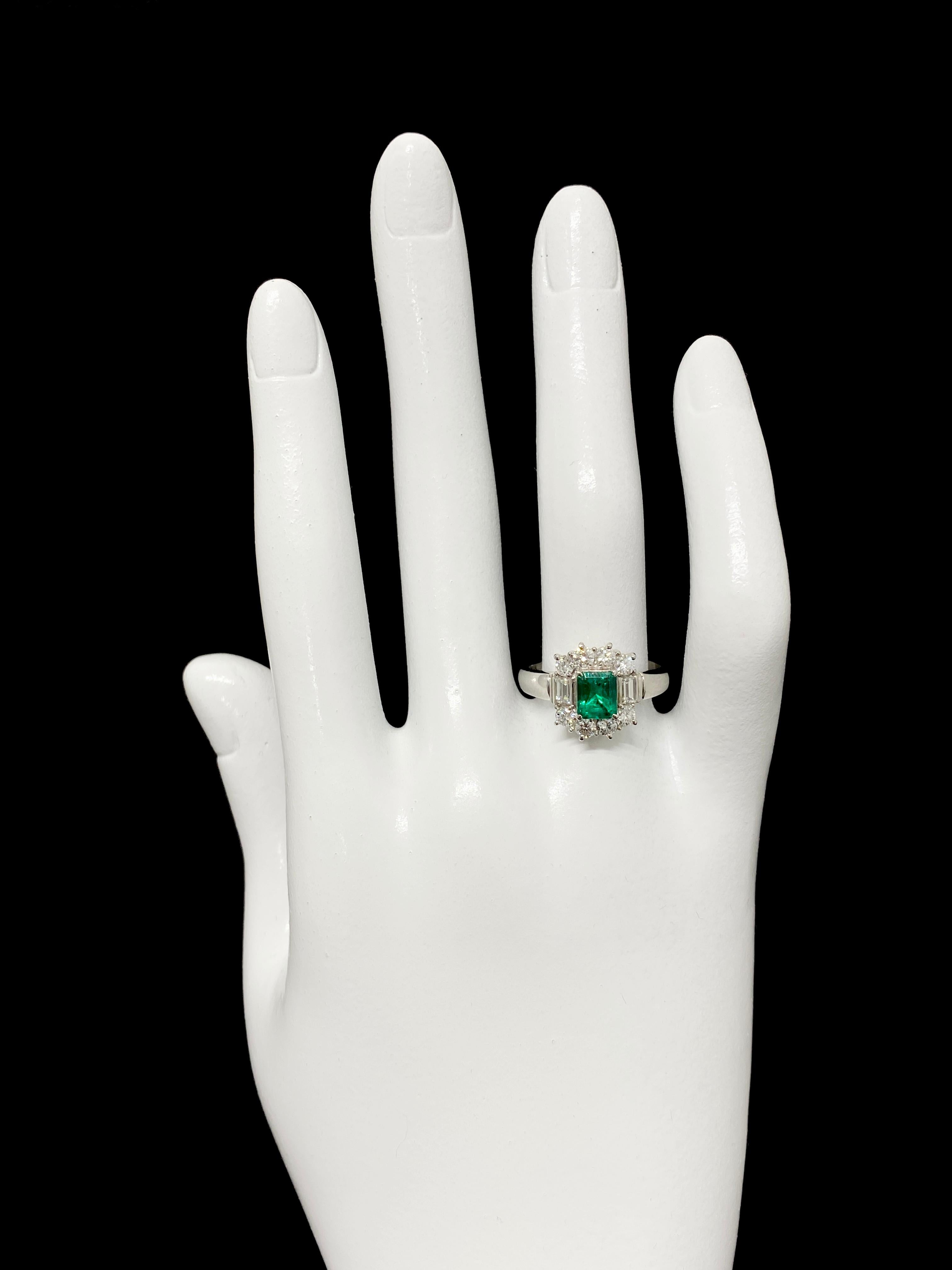 Women's 0.71 Carat Natural Emerald and Diamond Halo Ring Set in Platinum For Sale