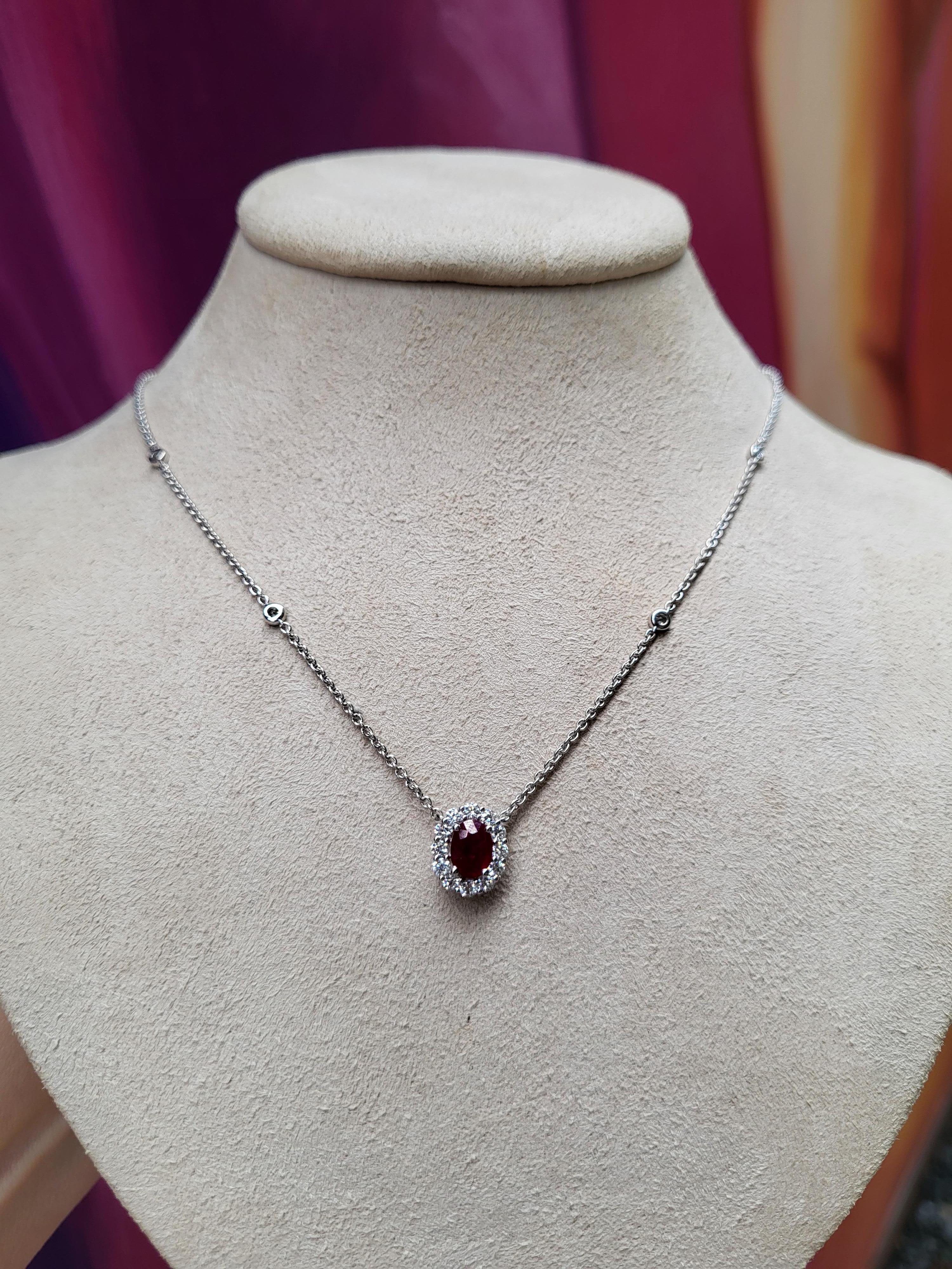 Women's or Men's 0.71 Carat Oval Cut Natural Ruby & Diamond Pendant Necklace, 18 Karat White Gold For Sale