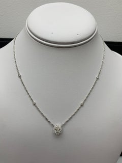Collana con rubino taglio ovale e diamanti da 0,71 carati in oro giallo 14K