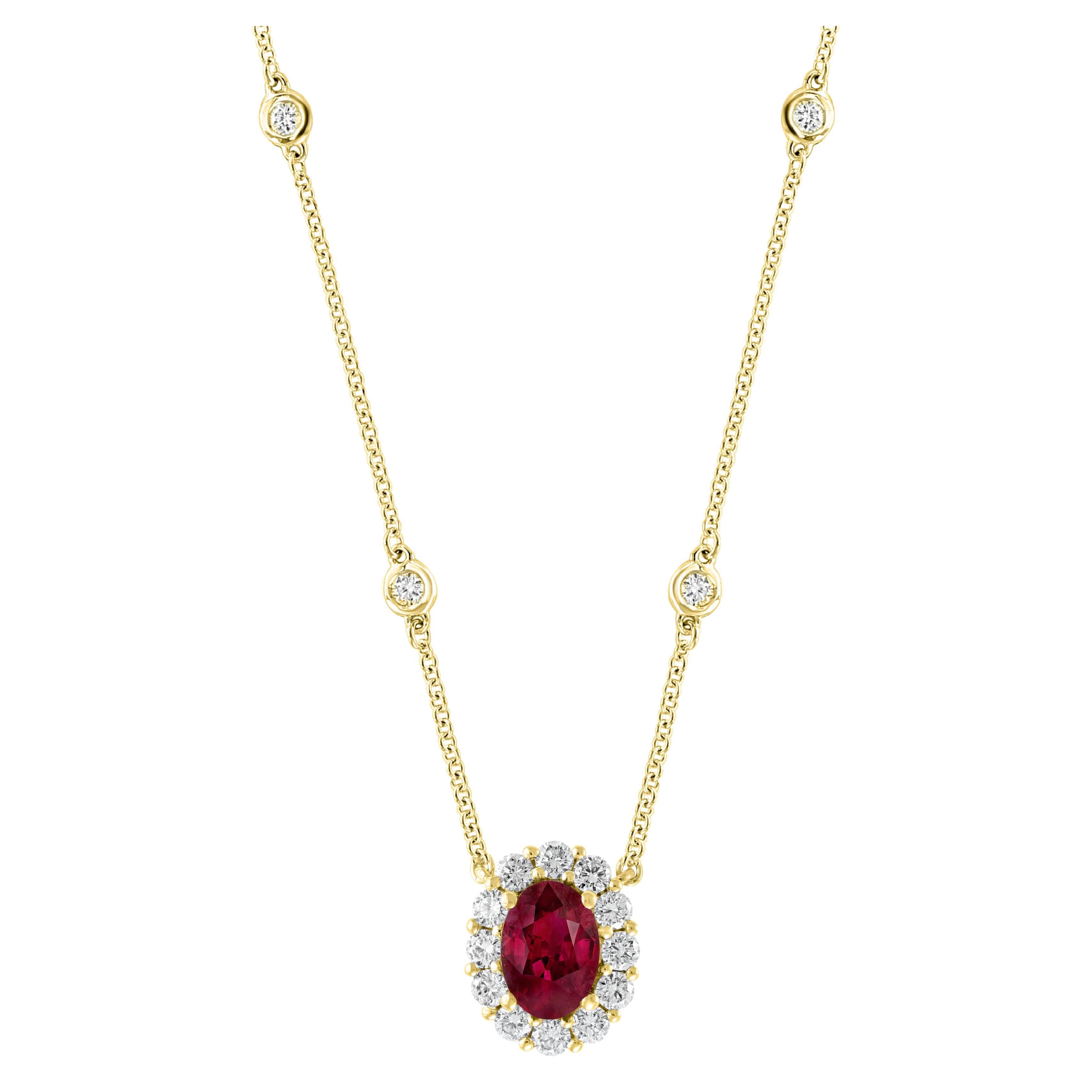 0.71 Carat Oval Cut Ruby and Diamond Pendant Necklace in 14K Yellow Gold For Sale