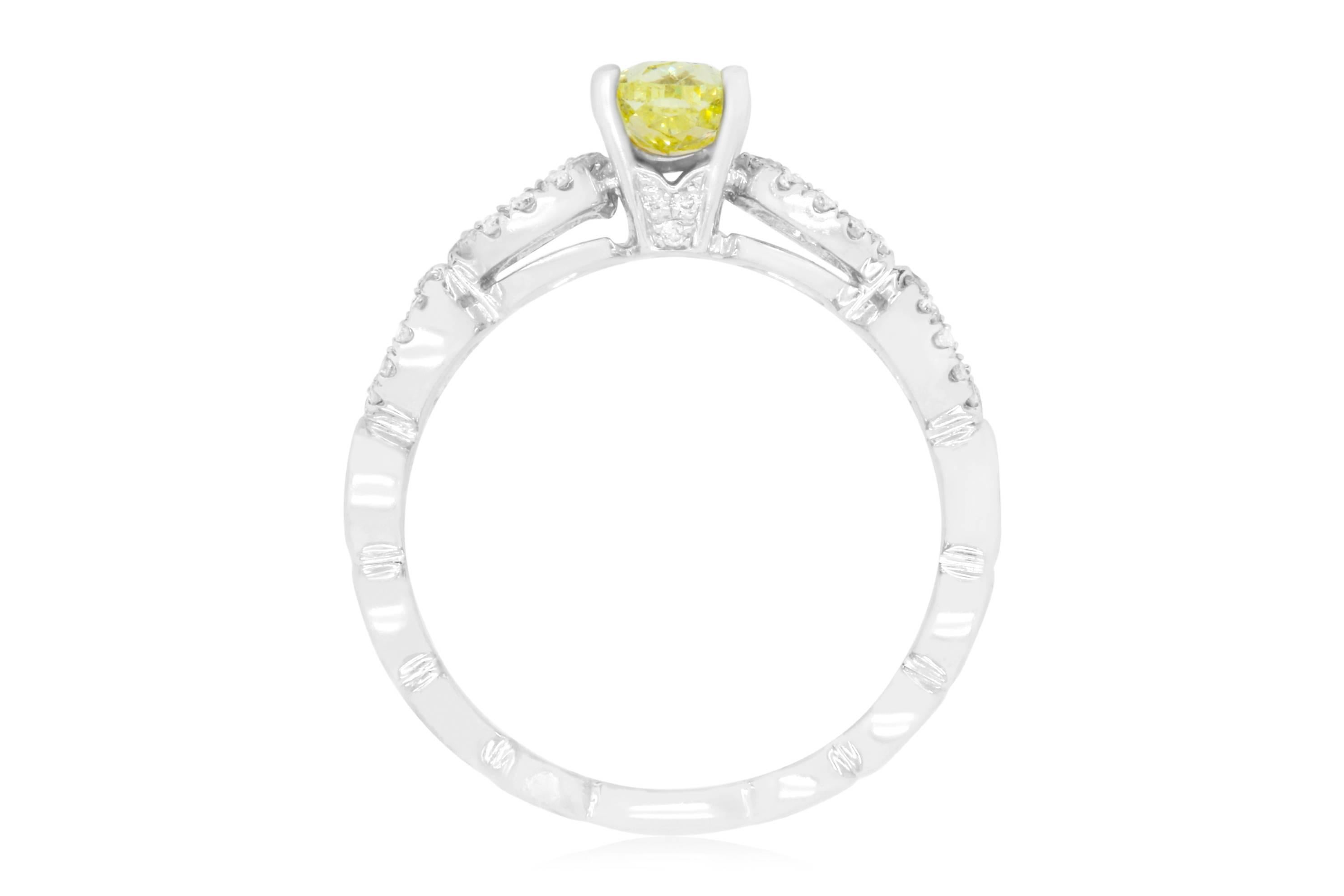 Contemporary 0.71 Carat Oval Cut Yellow Diamond Engagement Ring