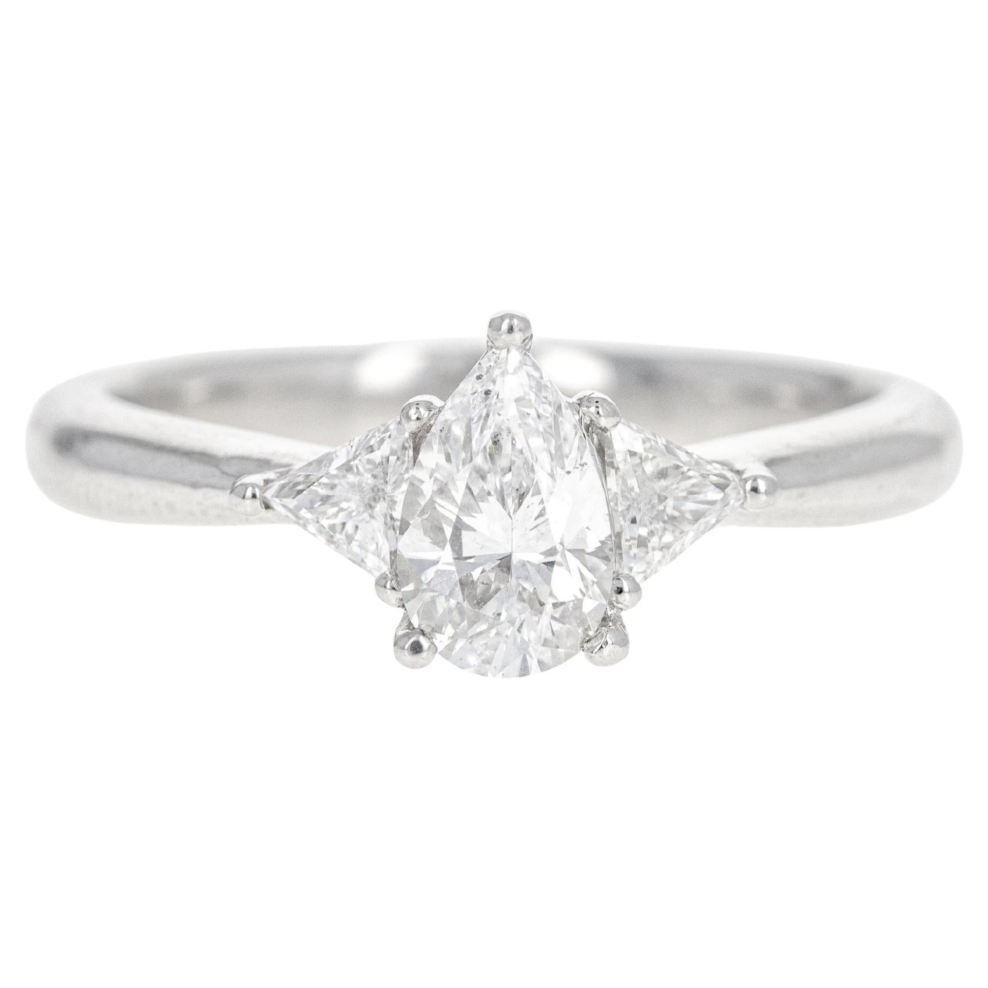 0.71 Carat Pear Diamond Trillion Three Stone Ring