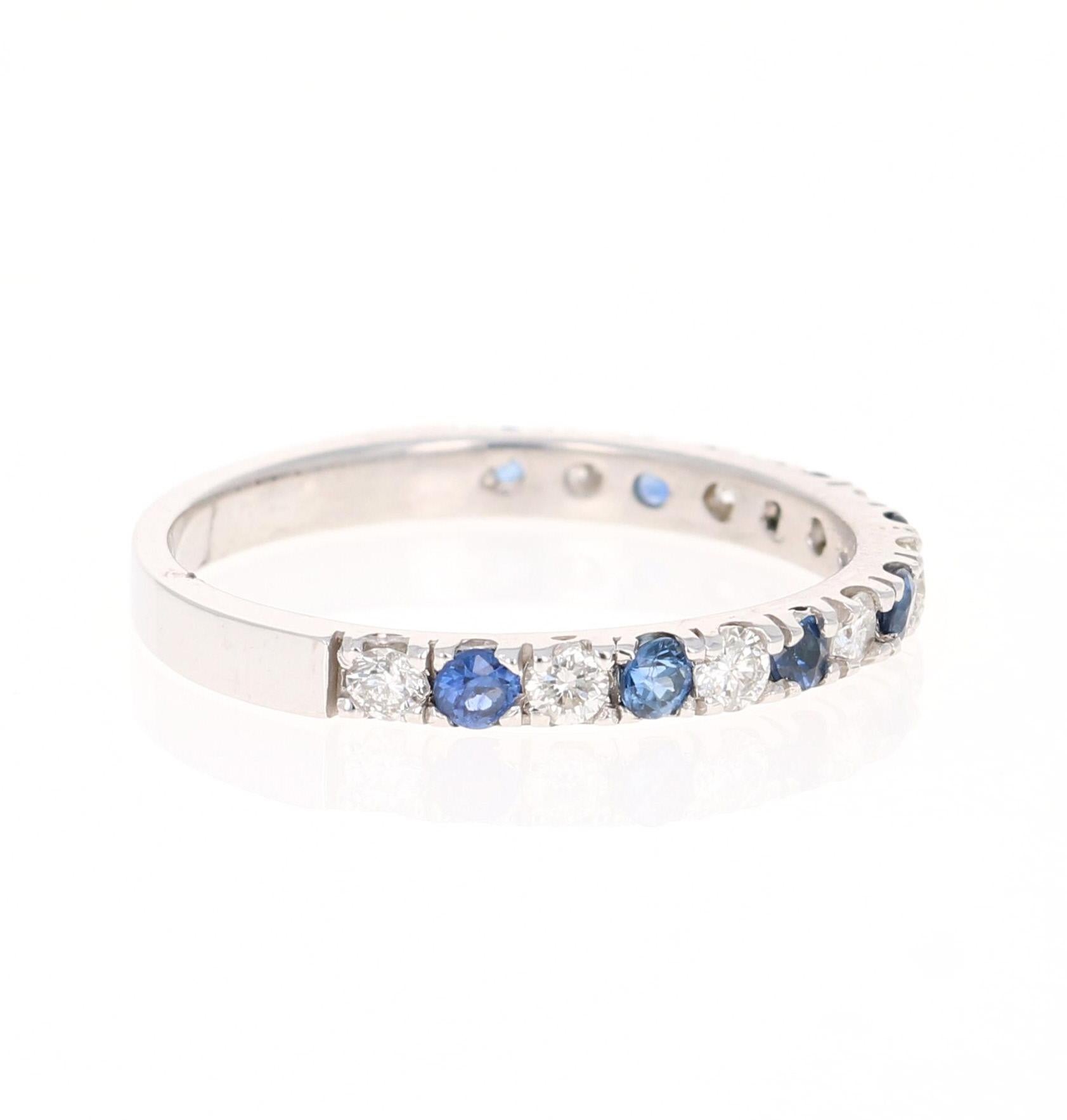 Cute and dainty Sapphire and Diamond band that is sure to be a great addition to anyone's collection. 

There are 8 Round Cut Sapphires that weigh 0.40 carats and 8 Round Cut Diamonds that weigh 0.31 carats (Clarity: SI2, Color: F). The total carat