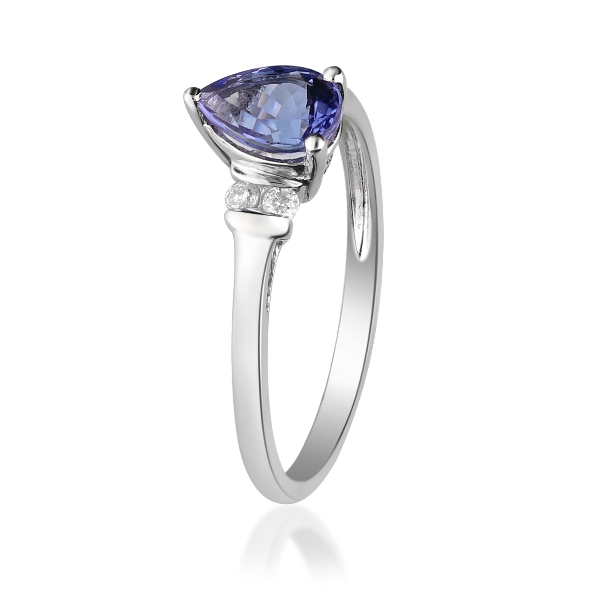 Art Deco 0.71 Carat Tanzanite Pear Cut and Diamond 10 K White Gold Engagement Ring For Sale