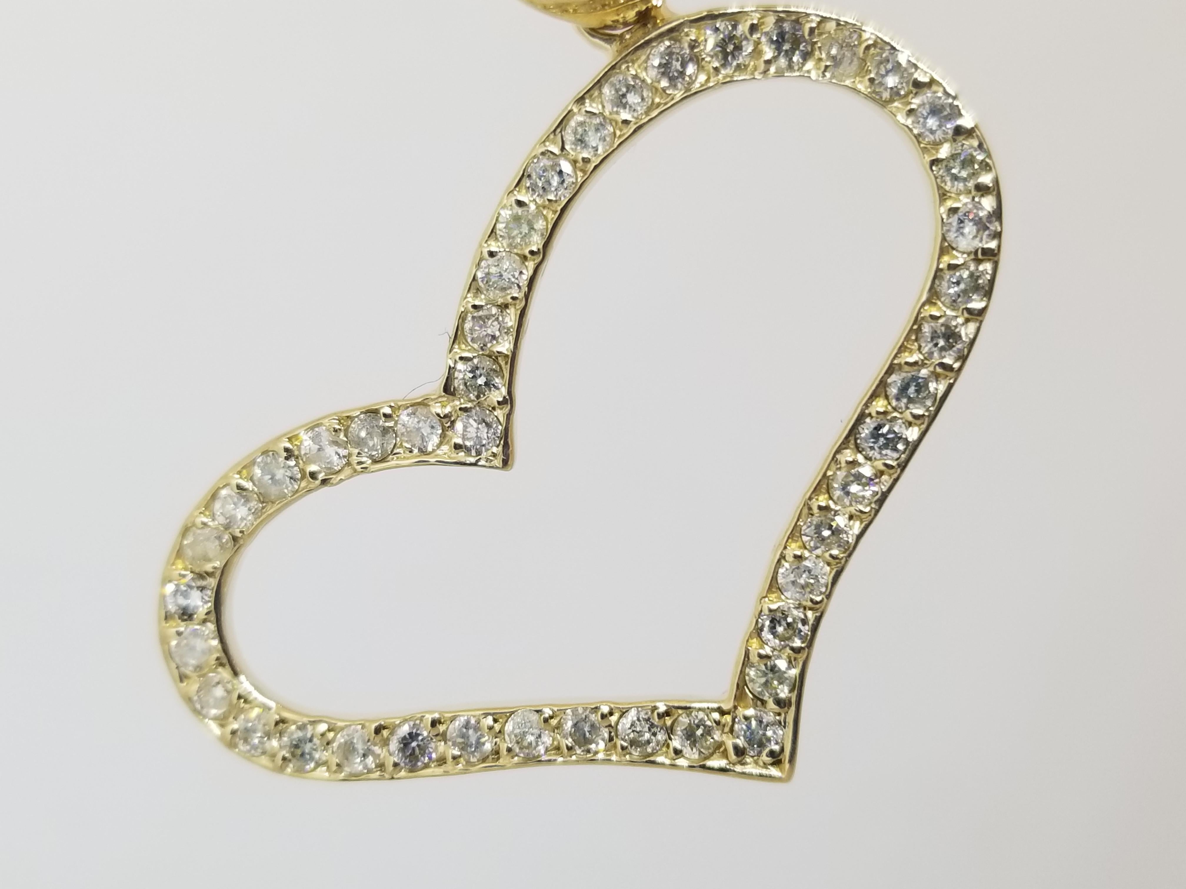 Very shiny, 0.71 ct heart shape pendant 14k yellow gold. natural diamonds.
Average Color I, Clarity I