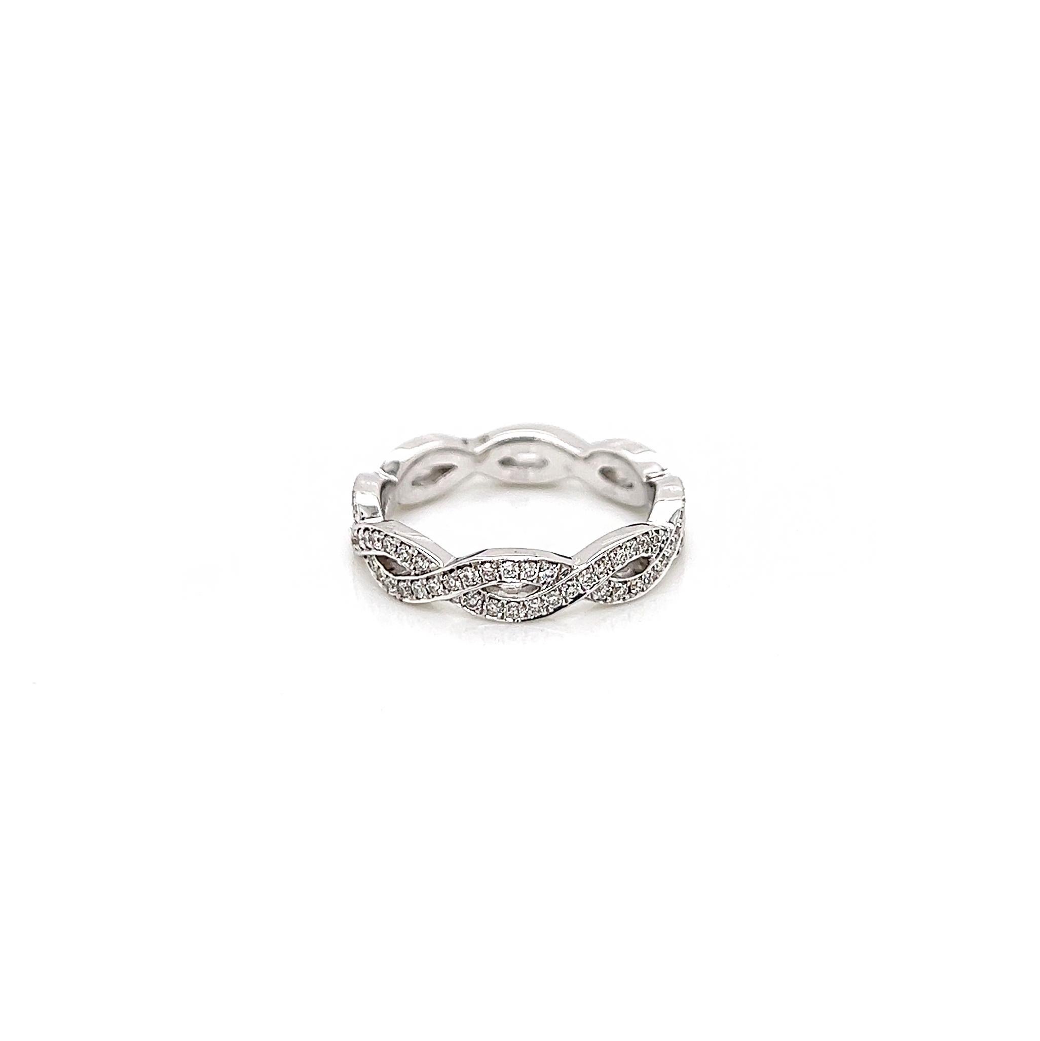 0.71Carat Ladies Pave-Set Diamond Eternity Band

-Metal Type: 18K White Gold
-0.71Carat Round Natural Diamonds
-F-G Color
-VS Clarity

-Size 6.75

Made in New York City