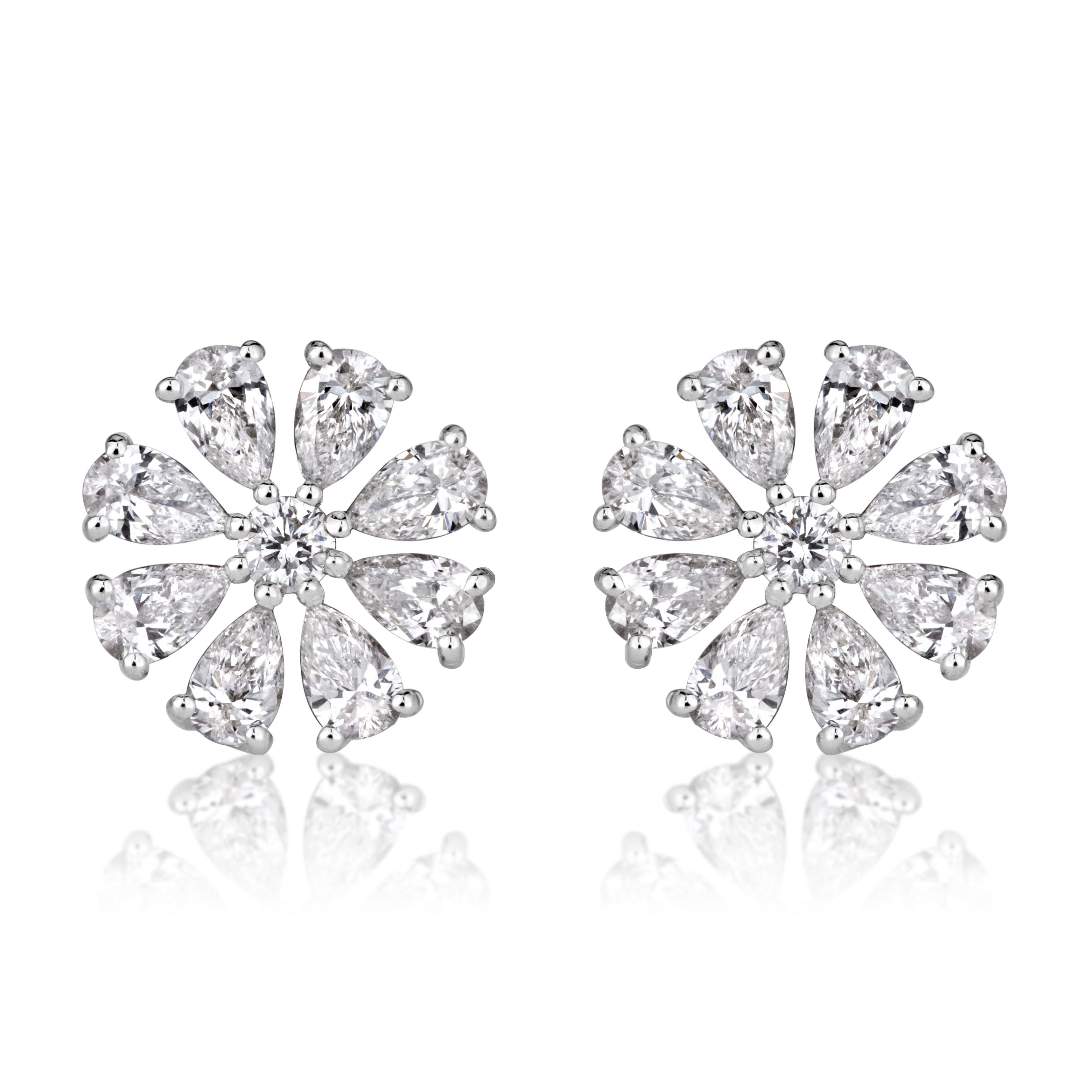 0.71ct Pear Shaped and Round Brilliant Cut Diamond Floral Stud Earrings in 18K For Sale